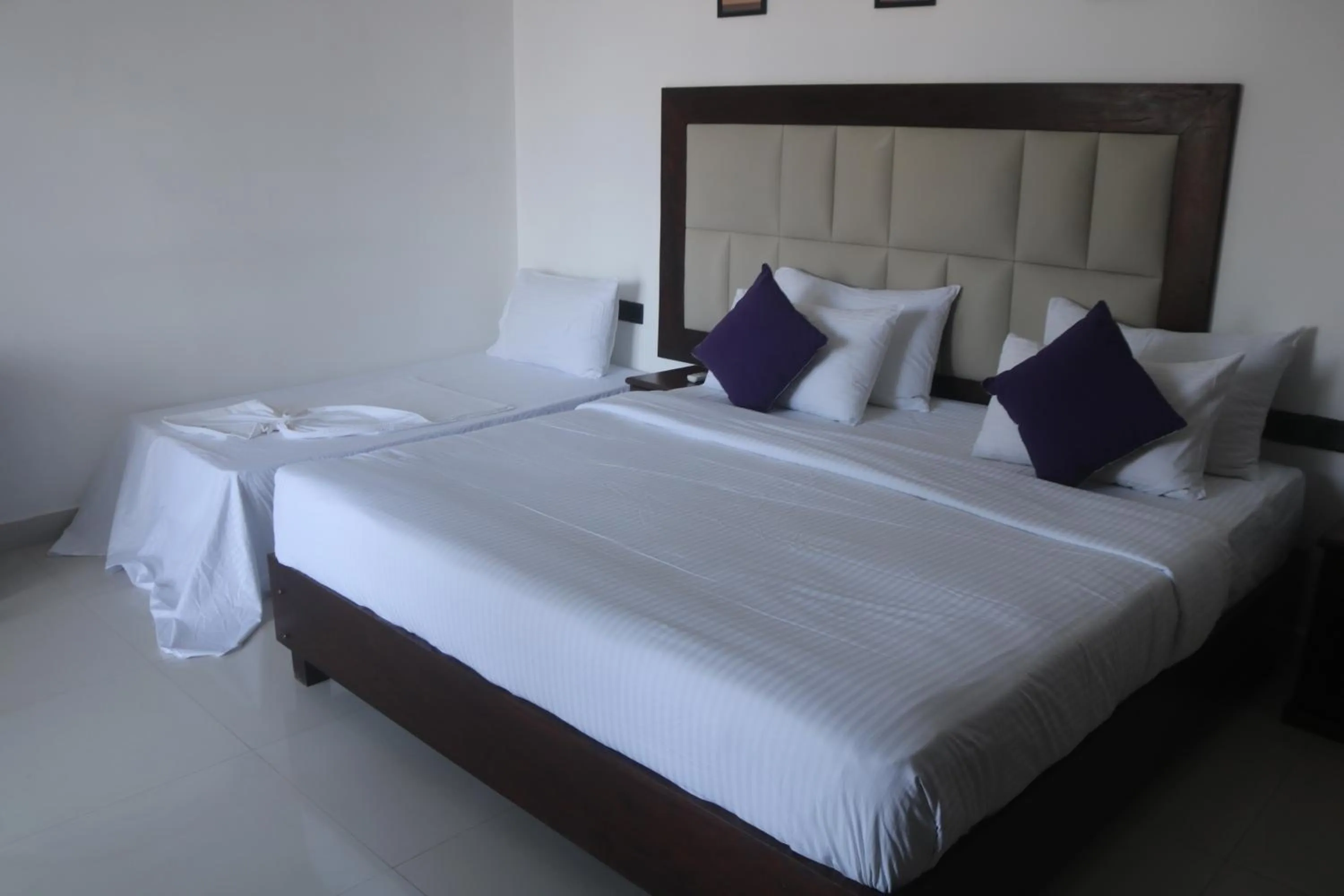 Bed in Mzion Hotel Weligama