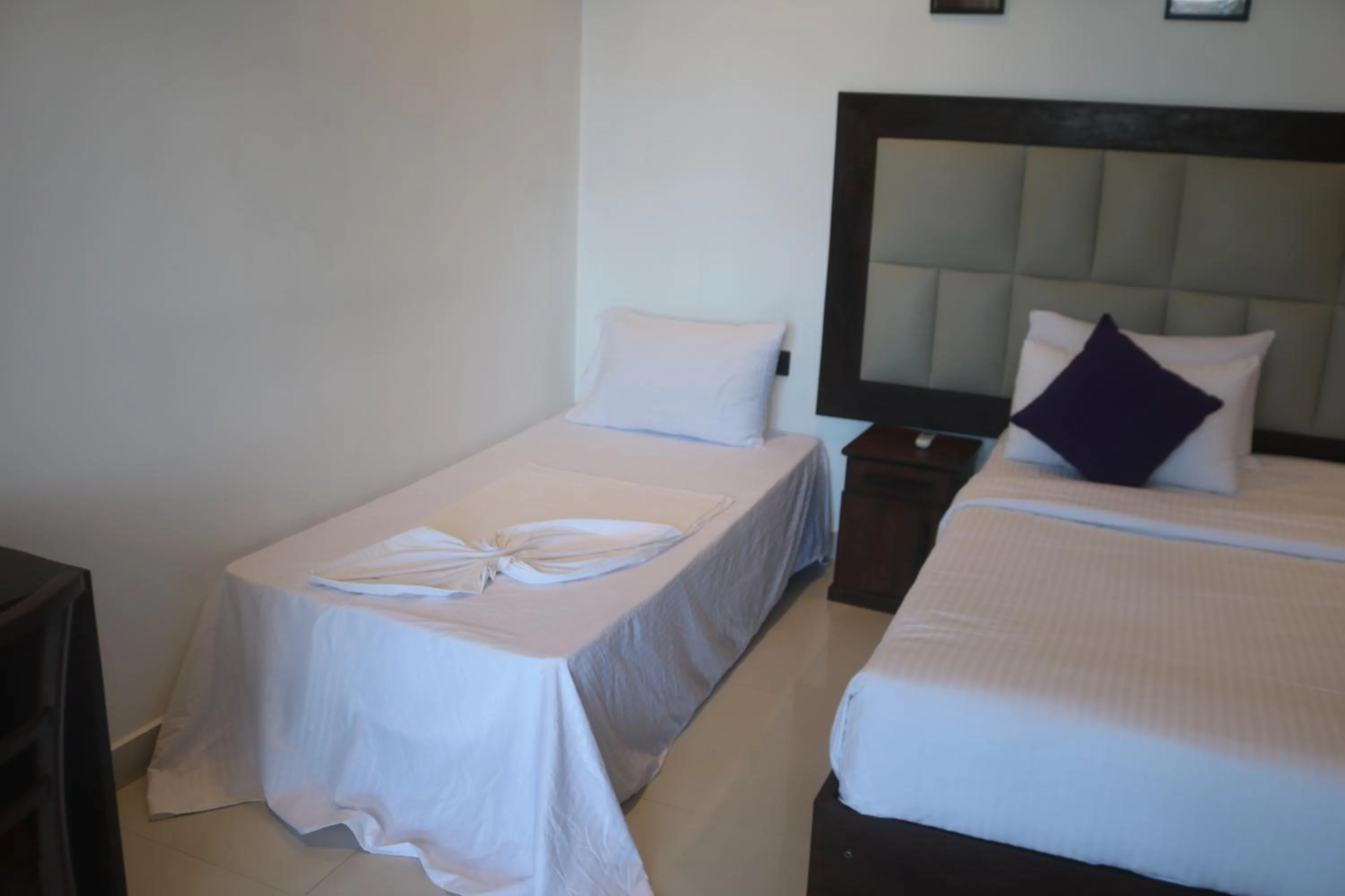 Bed in Mzion Hotel Weligama