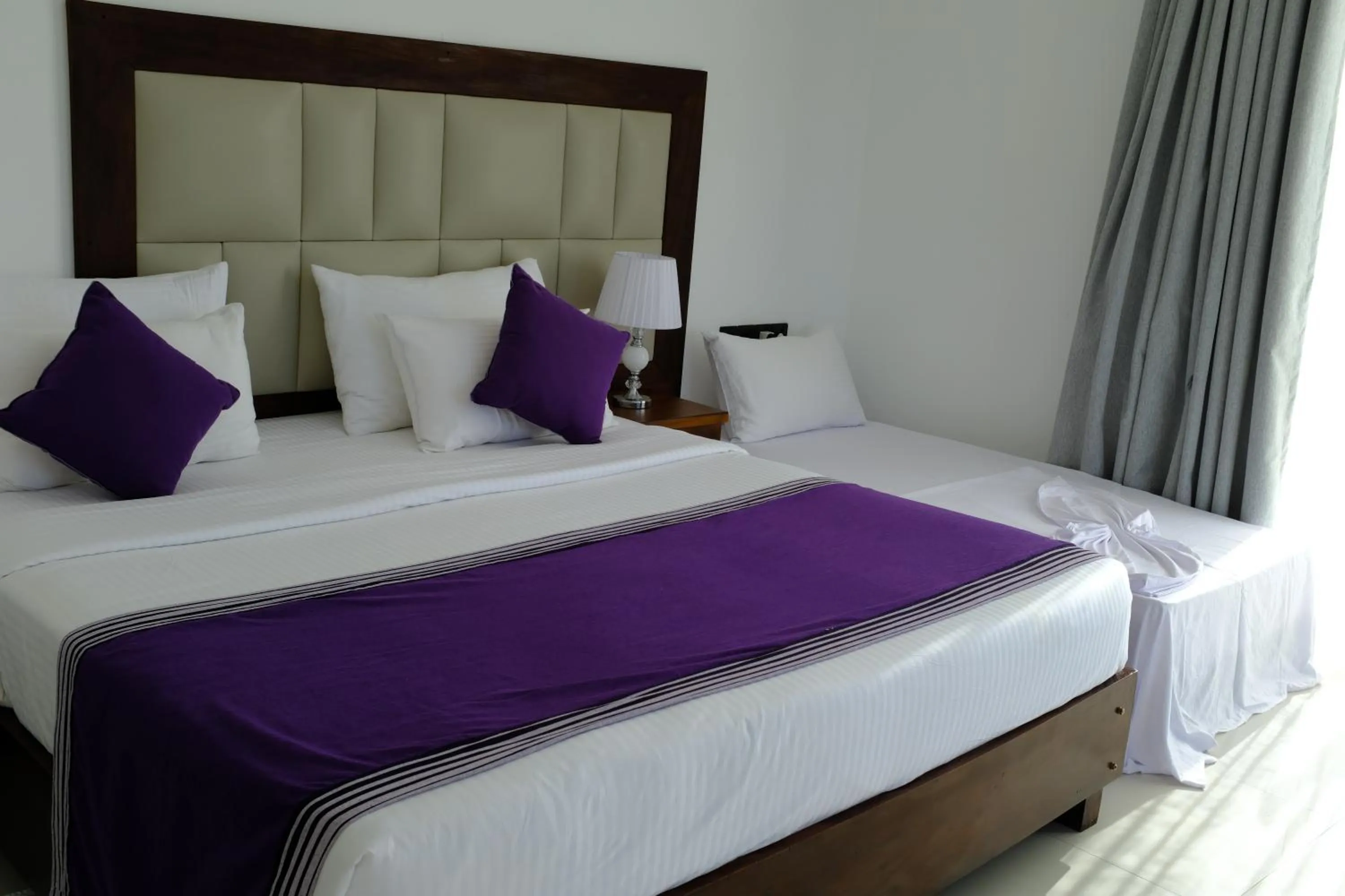 Bed in Mzion Hotel Weligama