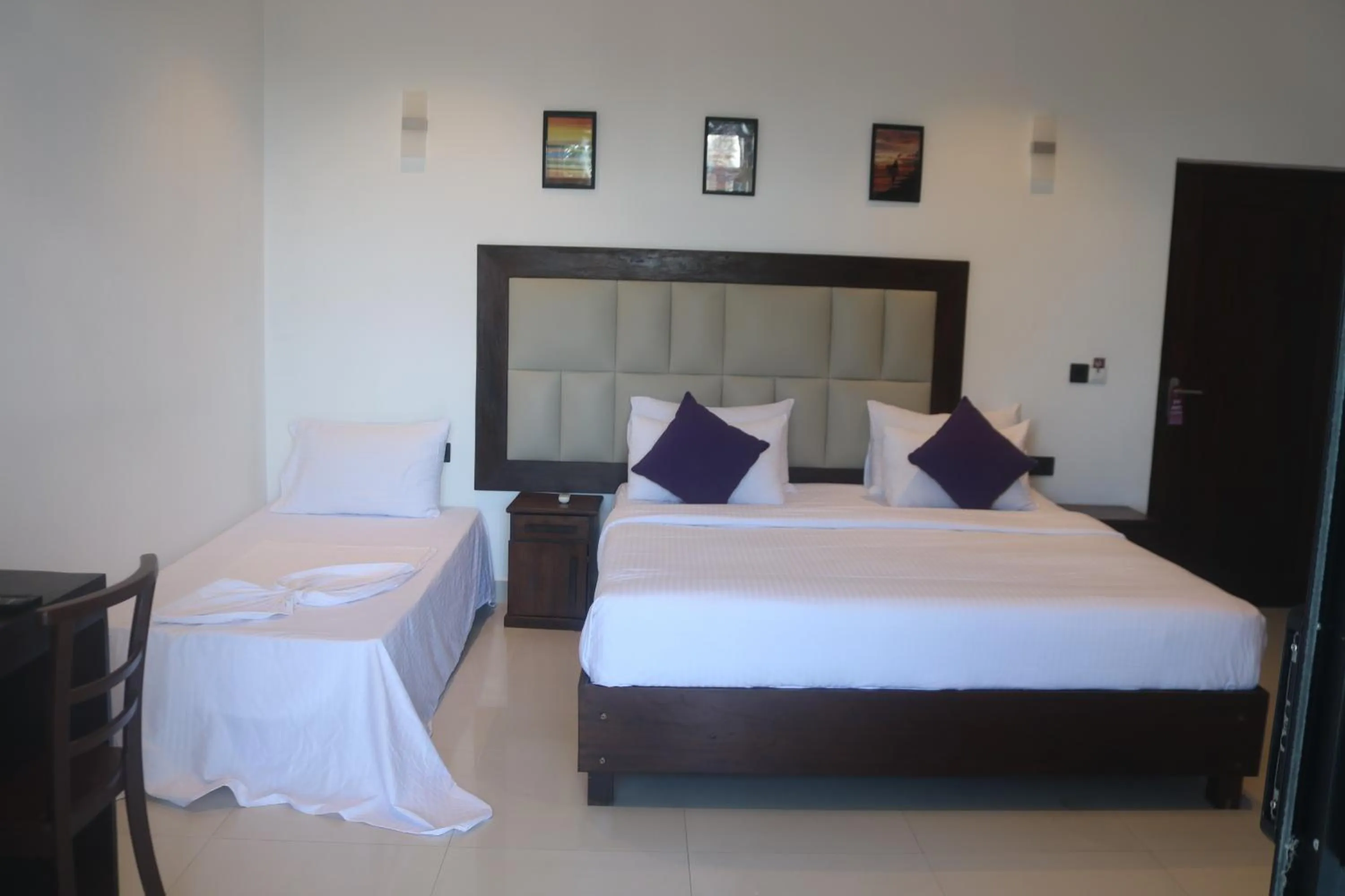 Bed in Mzion Hotel Weligama