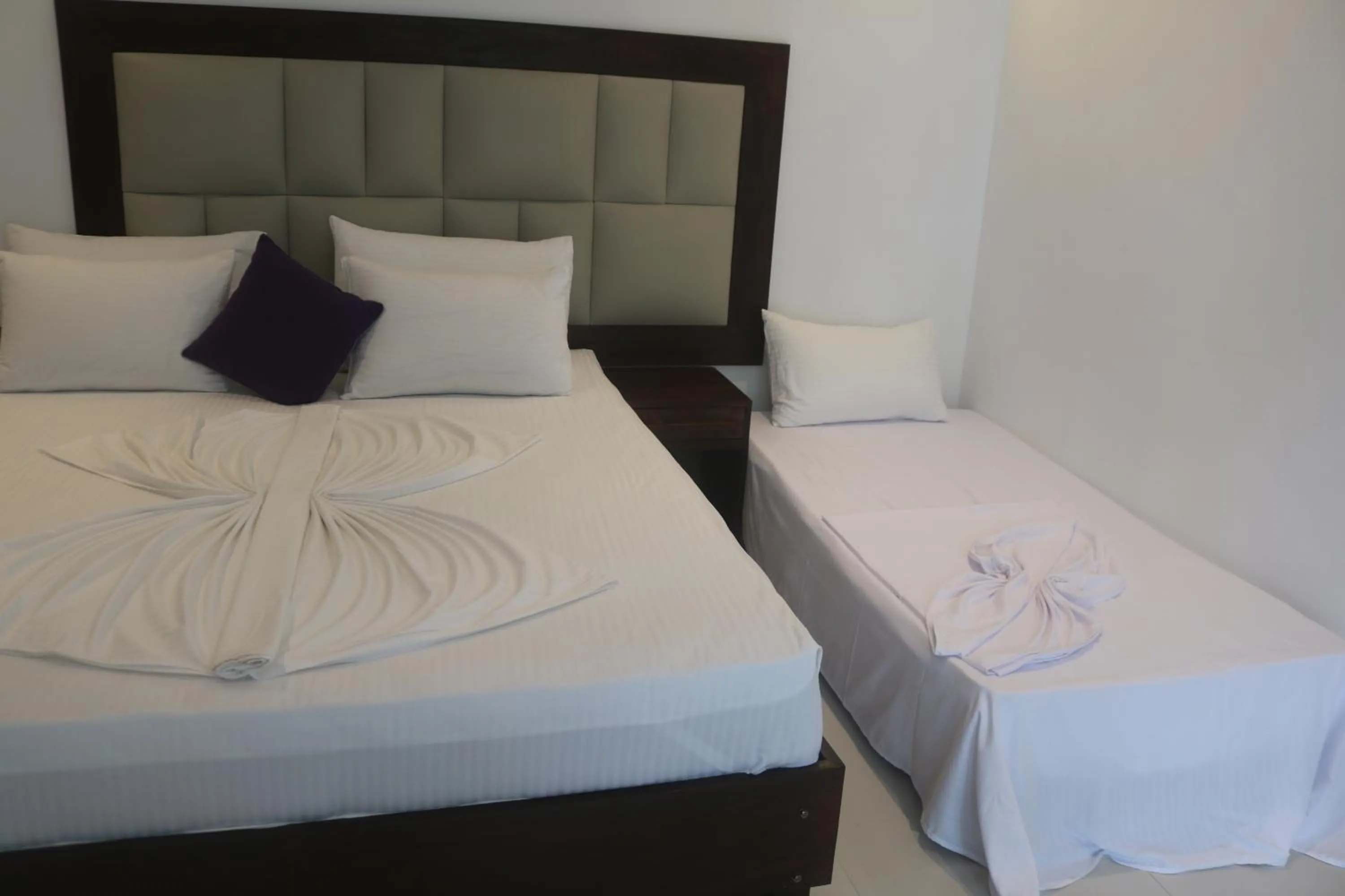 Bed in Mzion Hotel Weligama