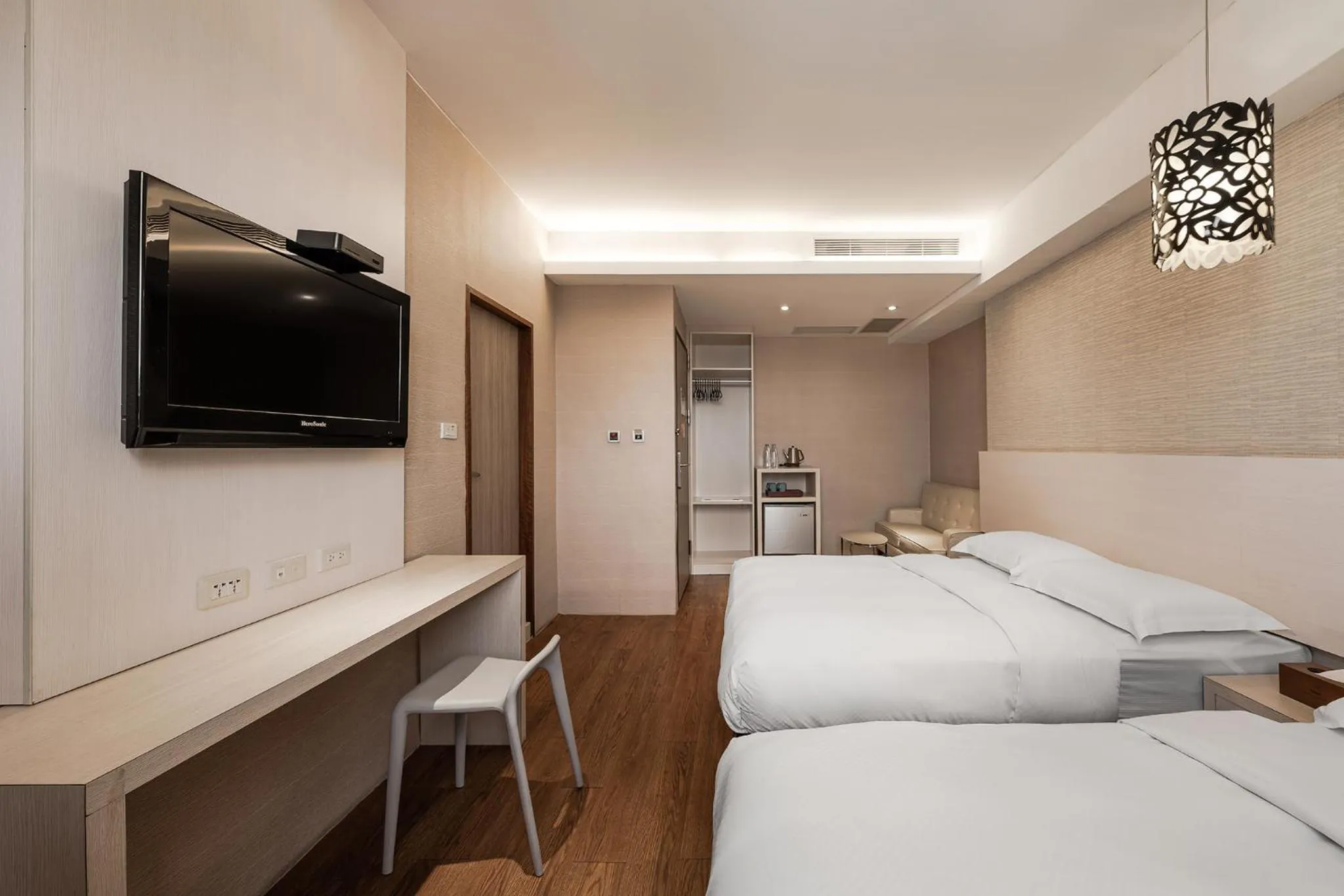 Bed in The Riverside Hotel Hengchun