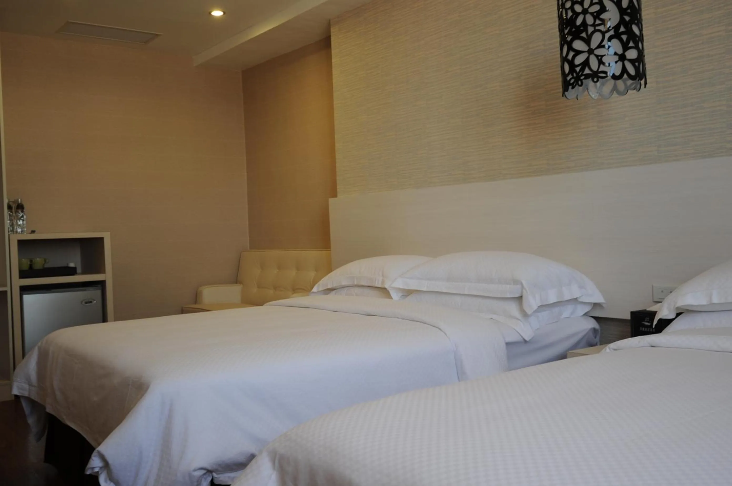 Photo of the whole room, Bed in The Riverside Hotel Hengchun