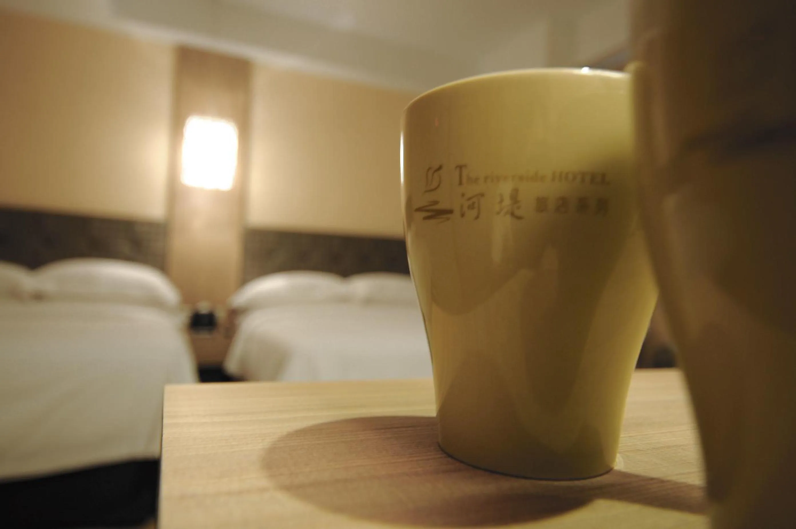 Property logo or sign, Bed in The Riverside Hotel Hengchun