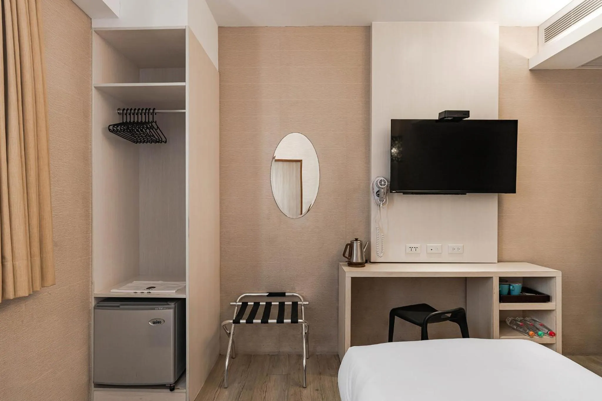 Photo of the whole room, Bed in The Riverside Hotel Hengchun