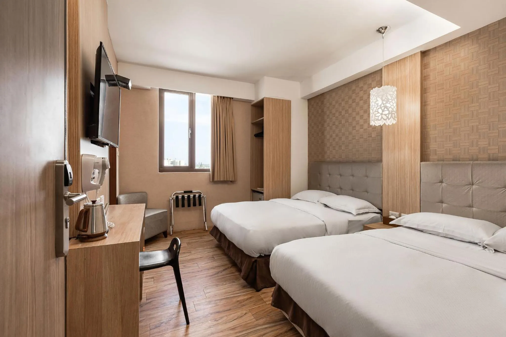 Bed in The Riverside Hotel Hengchun