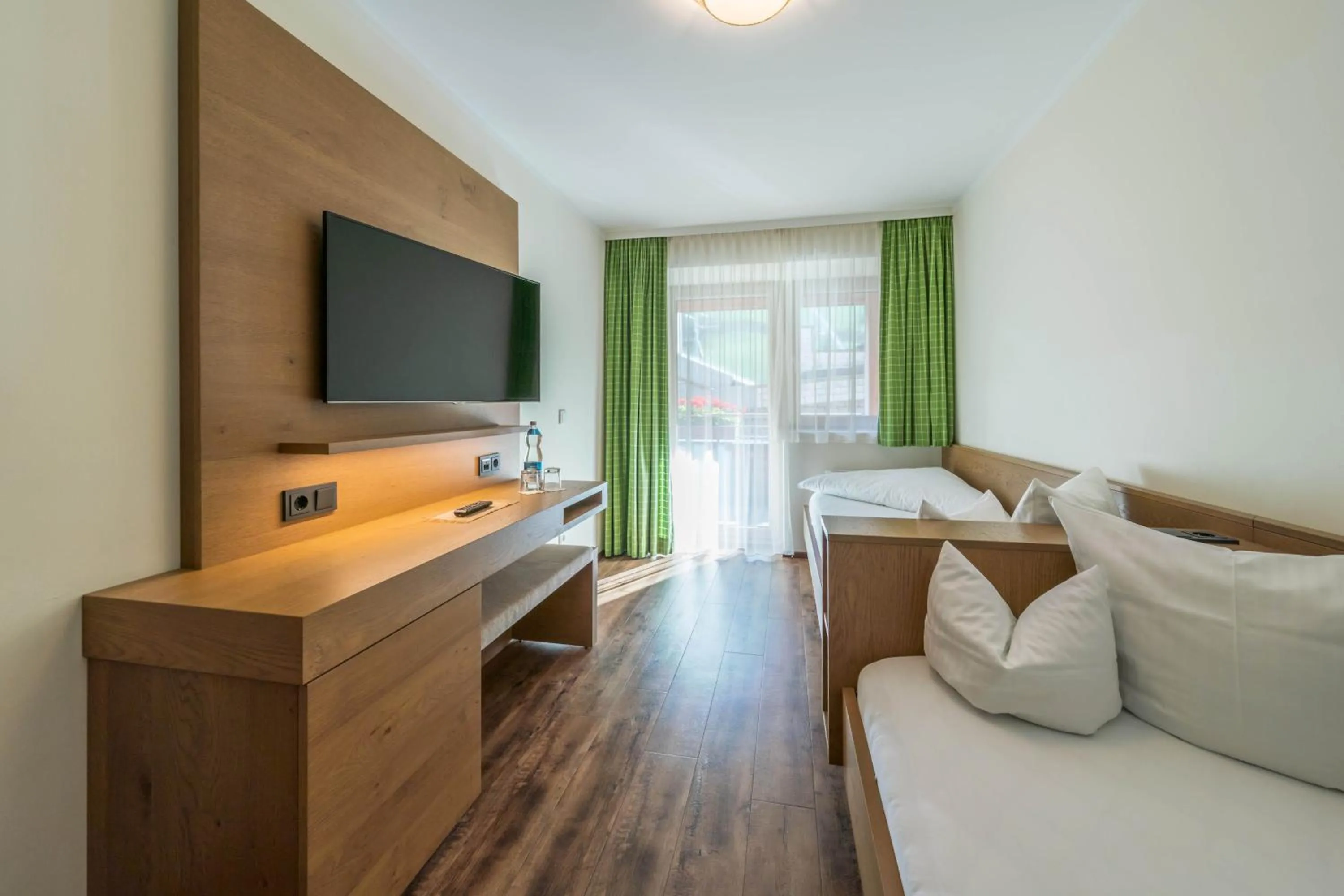 Bedroom, Bed in Aktivhotel Tuxerhof