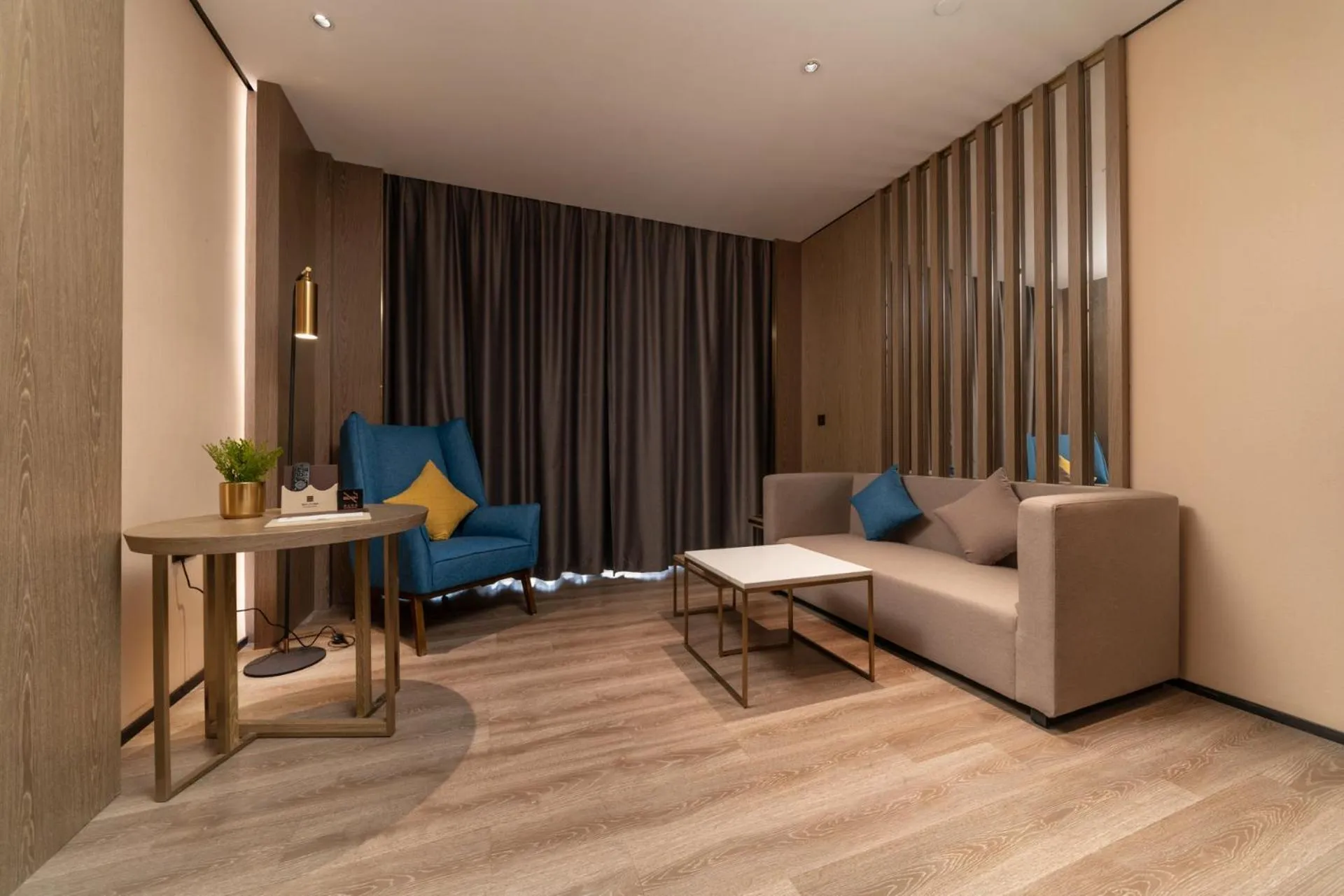 Living room in Echarm Plus Hotel - Foshan Smart New City Zhangcha Metro Station Branch