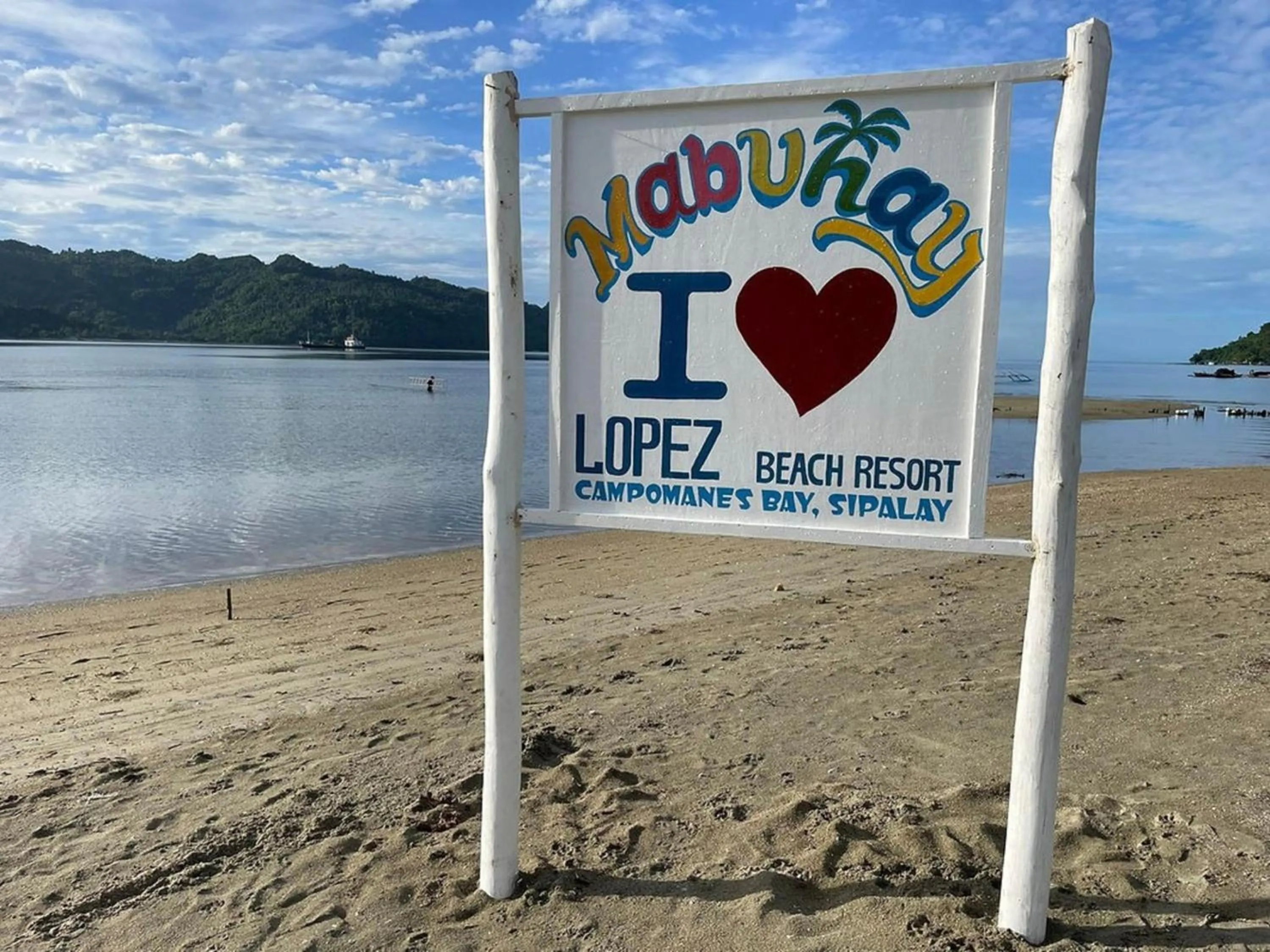 Property logo or sign in Lopez Beach Resort