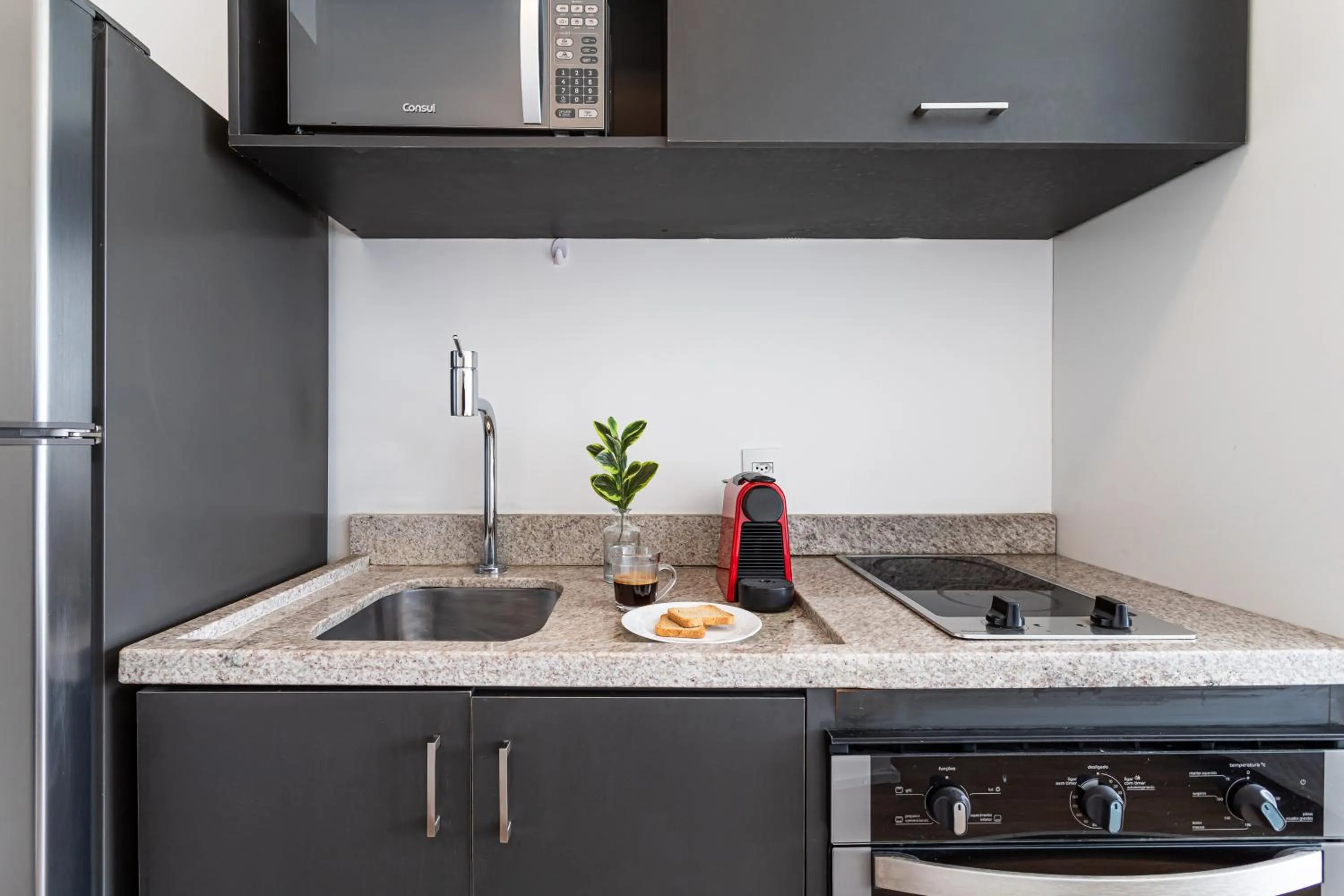 Kitchen or kitchenette in Setin Downtown Praca da Sé by Viva - Prédio completo com piscina perto de estação de metrô no Centro de São Paulo