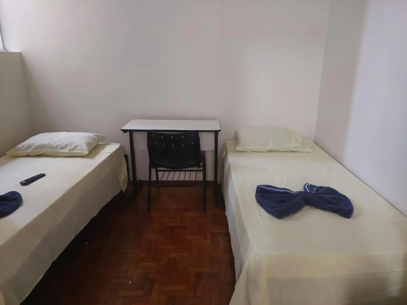 Bed in CENTRALHE HOTEL