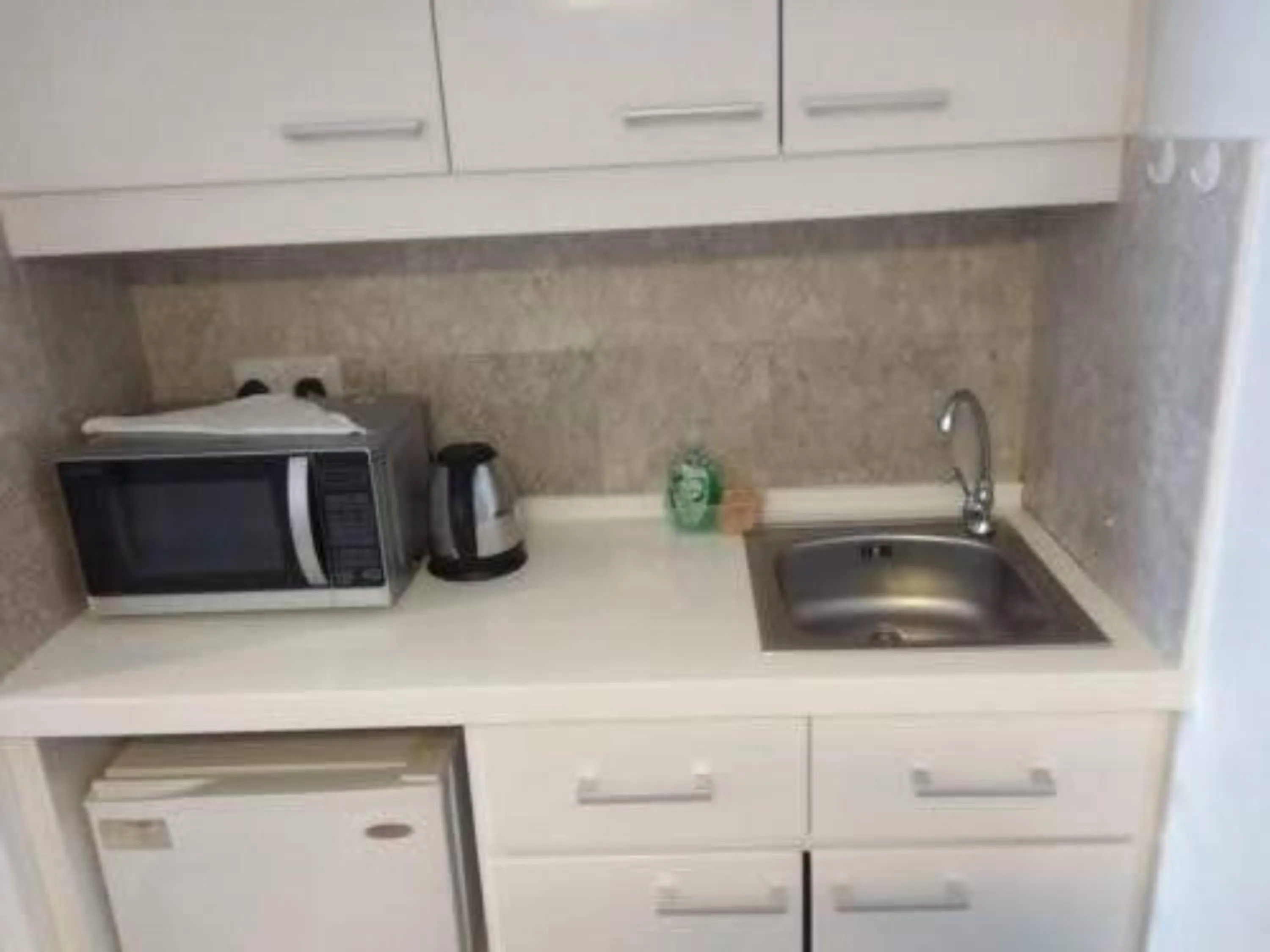 Kitchen or kitchenette in Times Square Kuala Lumpur By Service Suite