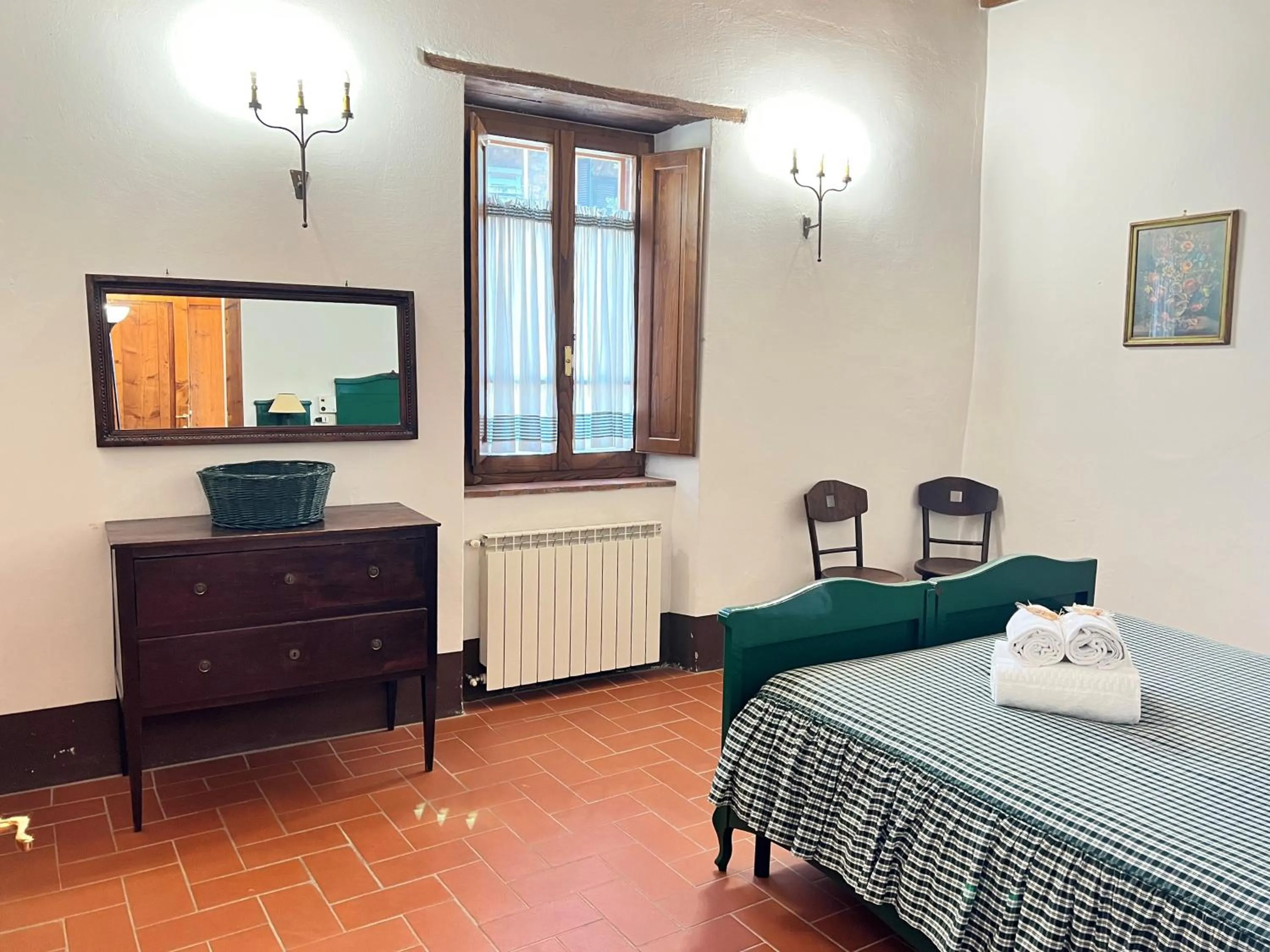 Bed in Fattoria Lornano Winery