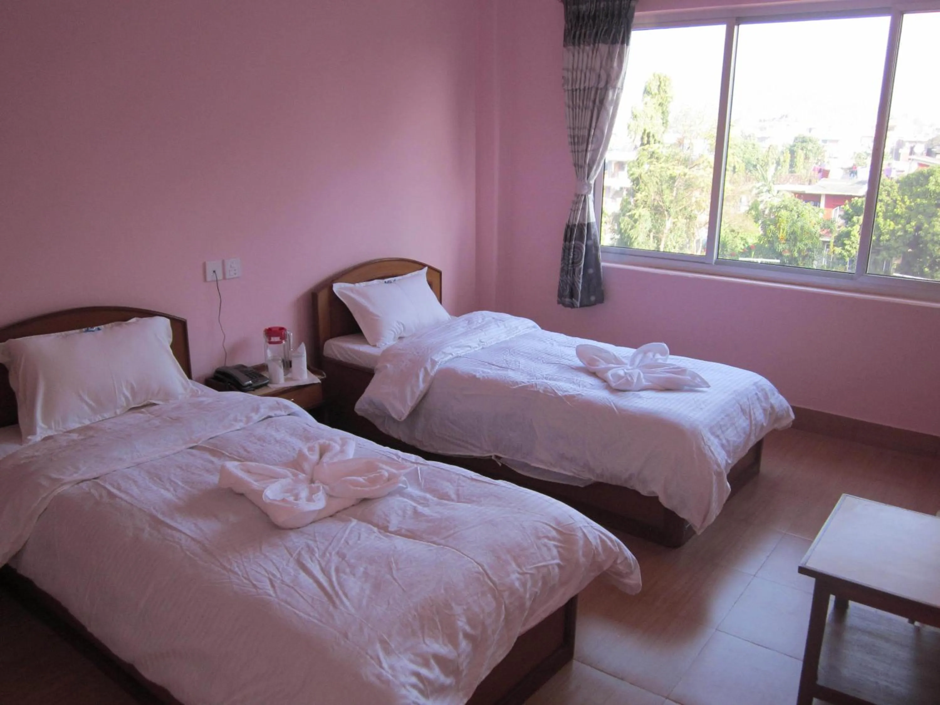 Bedroom in Hotel Milarepa Pvt Ltd