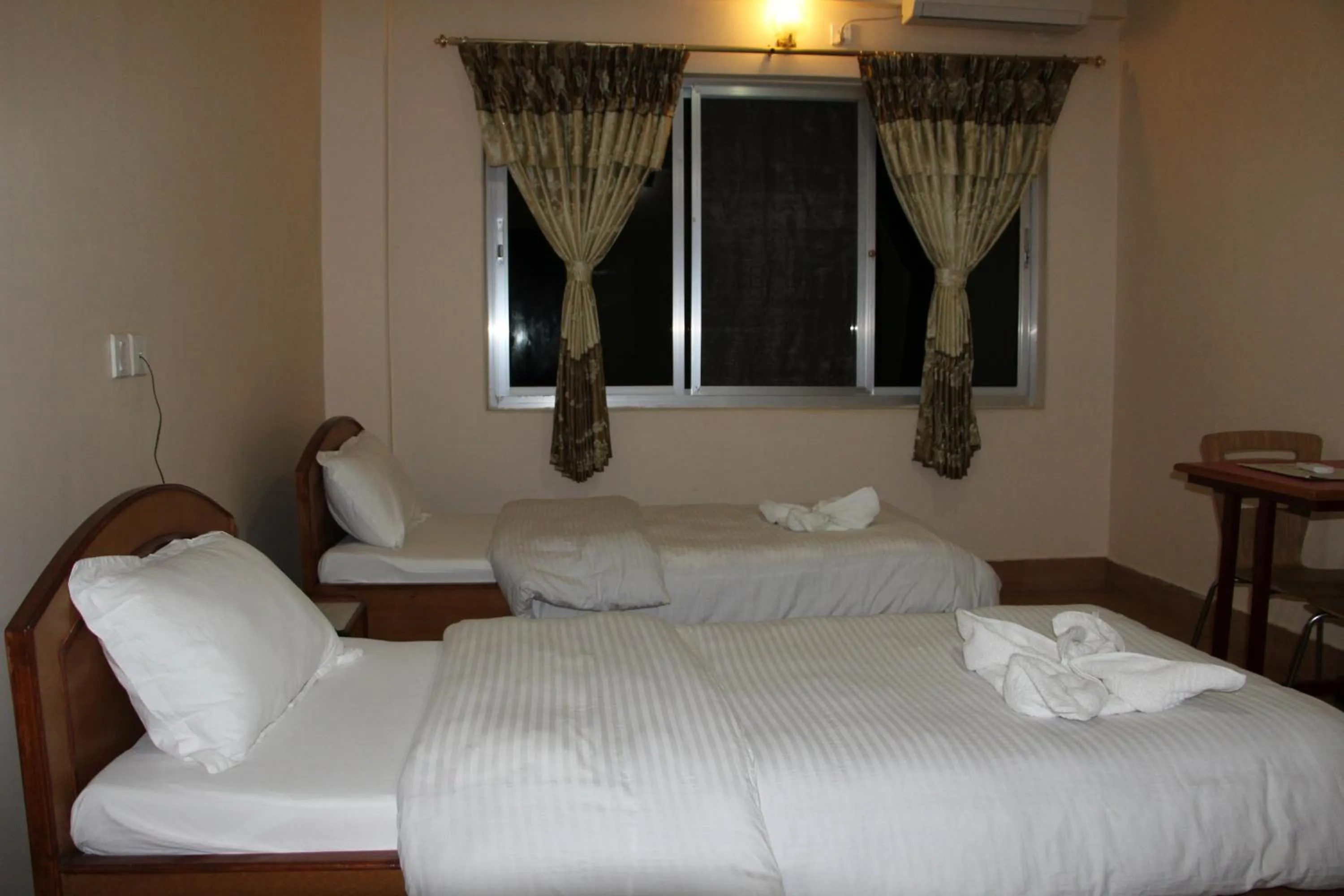 Bedroom in Hotel Milarepa Pvt Ltd