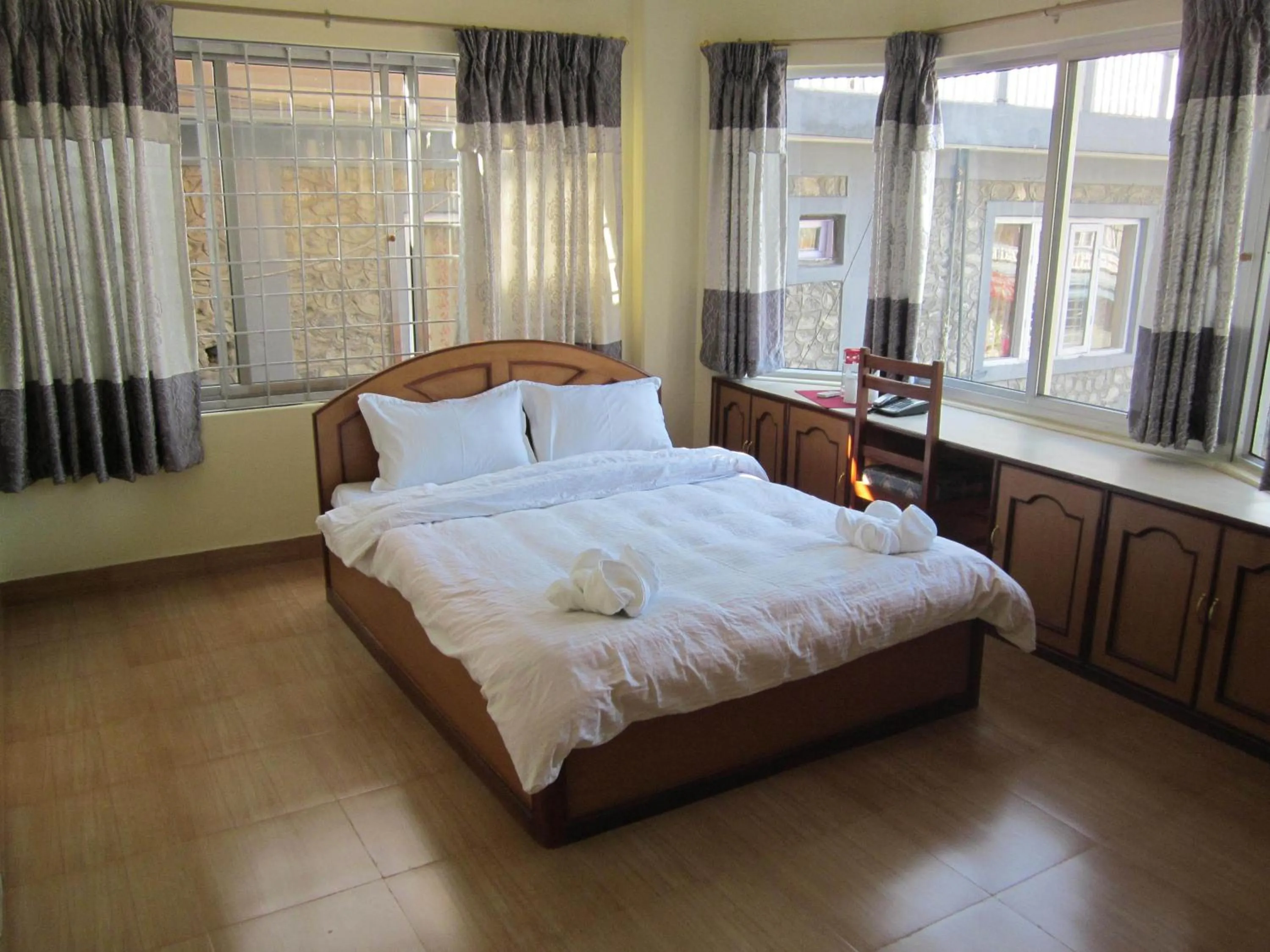 Bedroom in Hotel Milarepa Pvt Ltd