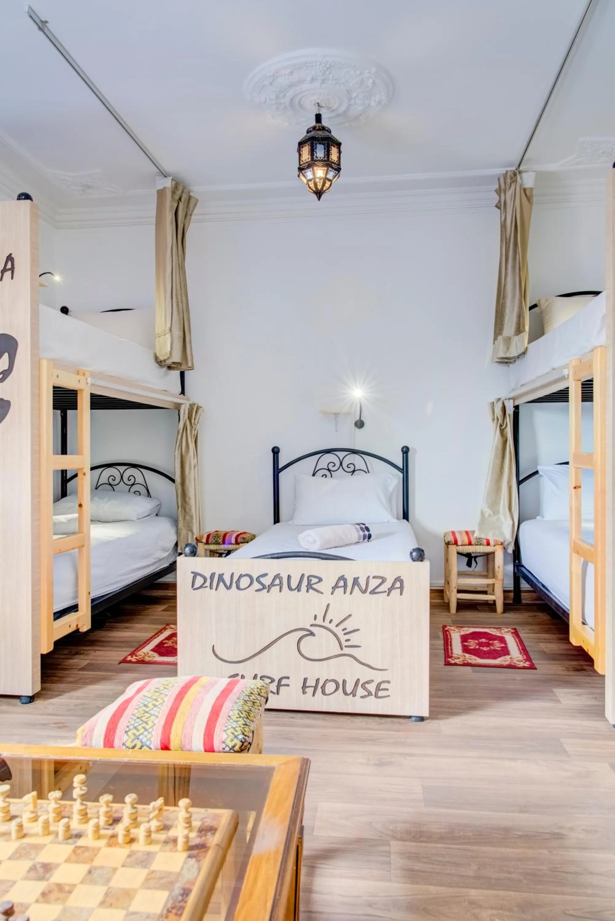 Bed in Dinosaur Anza Surf House