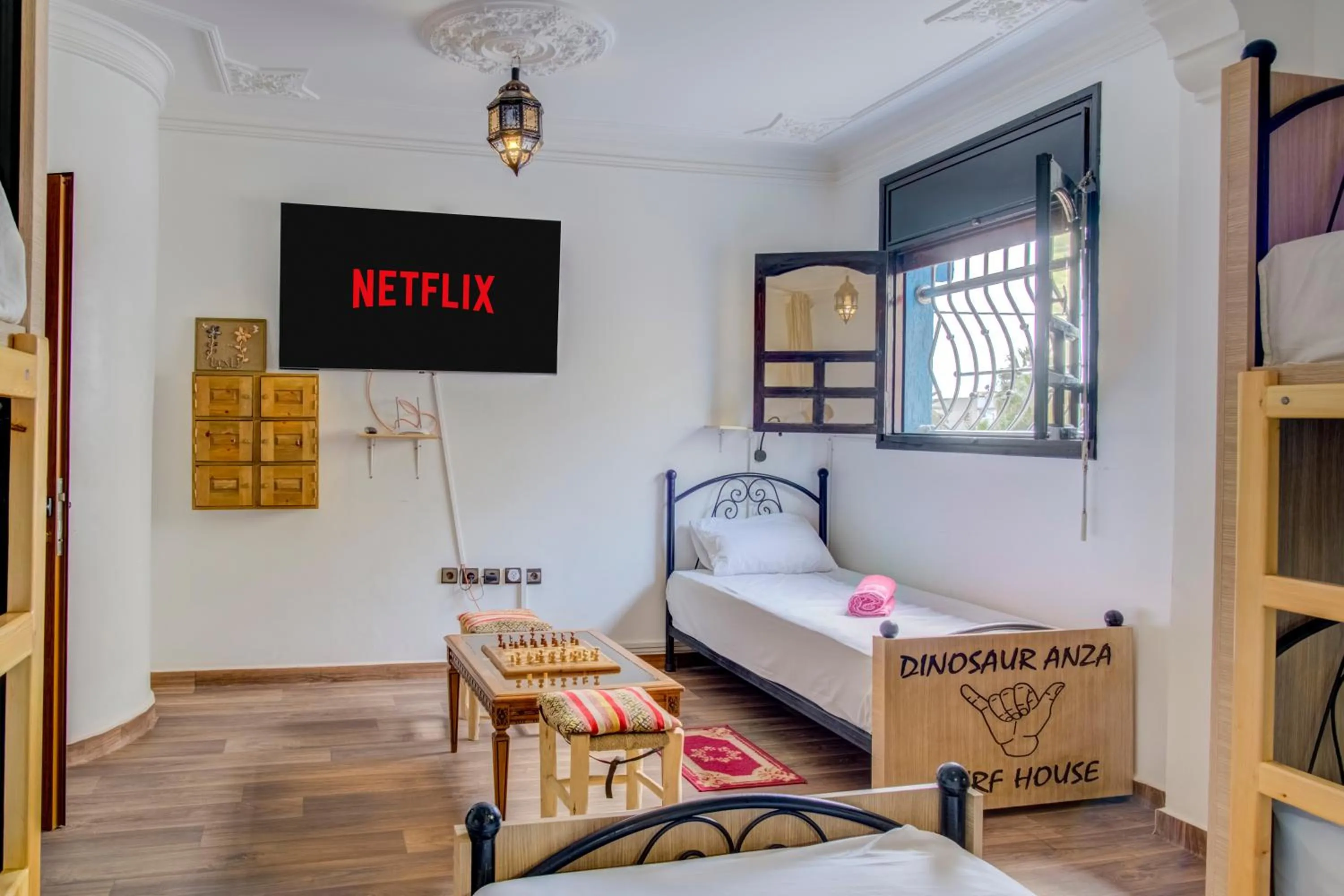 Bed in Dinosaur Anza Surf House