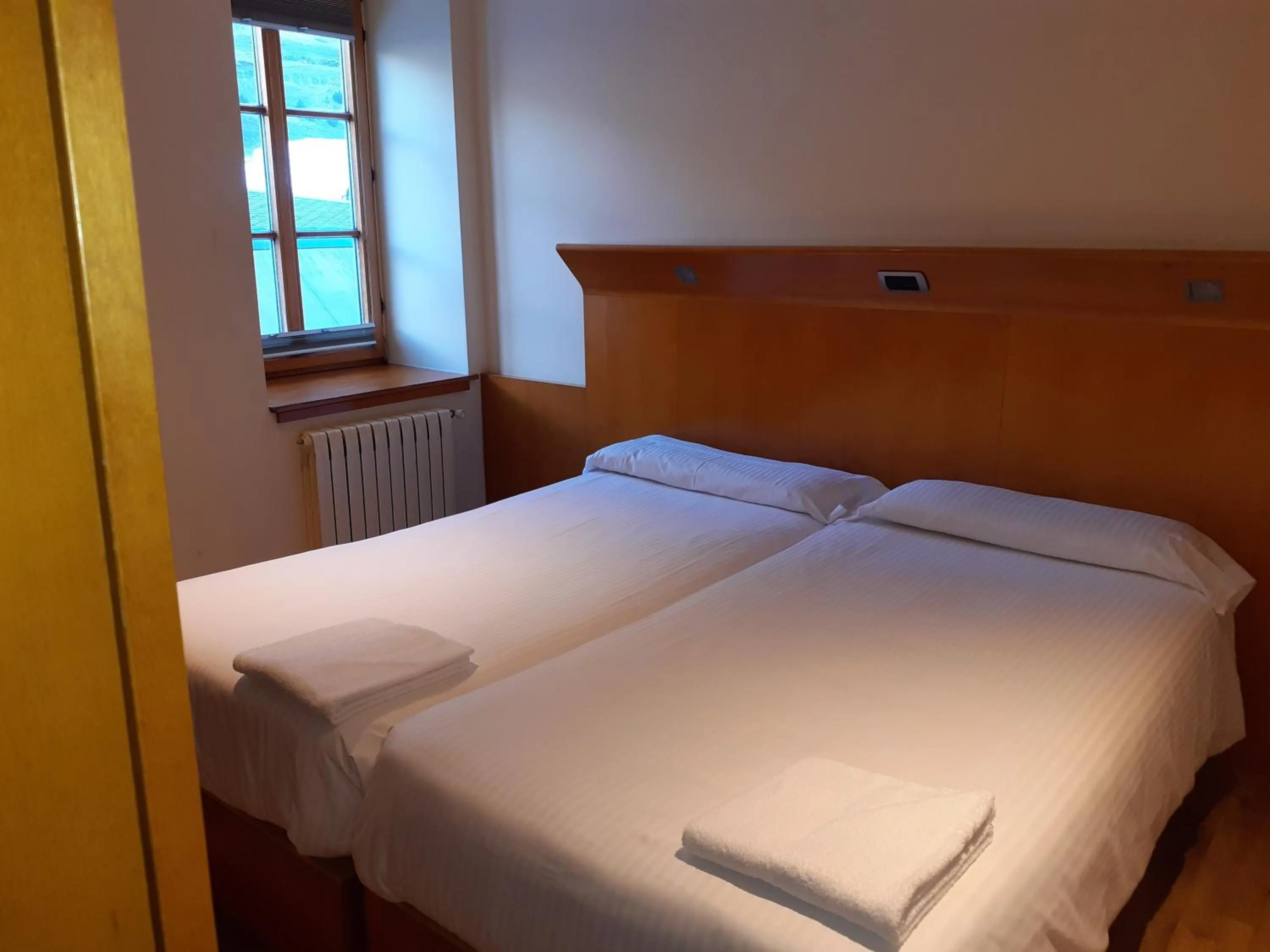 Bedroom, Bed in Apartaments Vall de Núria