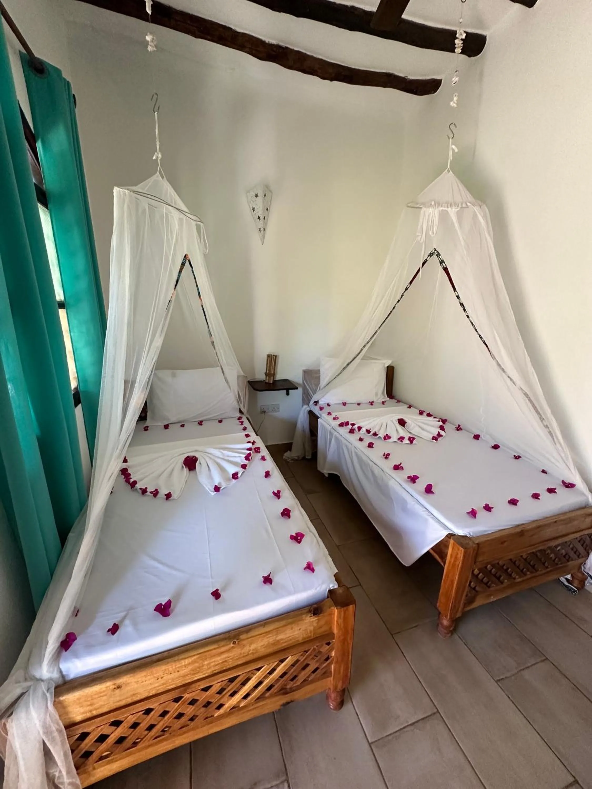 Bed in Kiwengwa Bungalow Boutique Resort