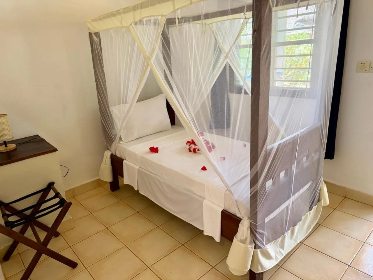 Bed in Kiwengwa Bungalow Boutique Resort