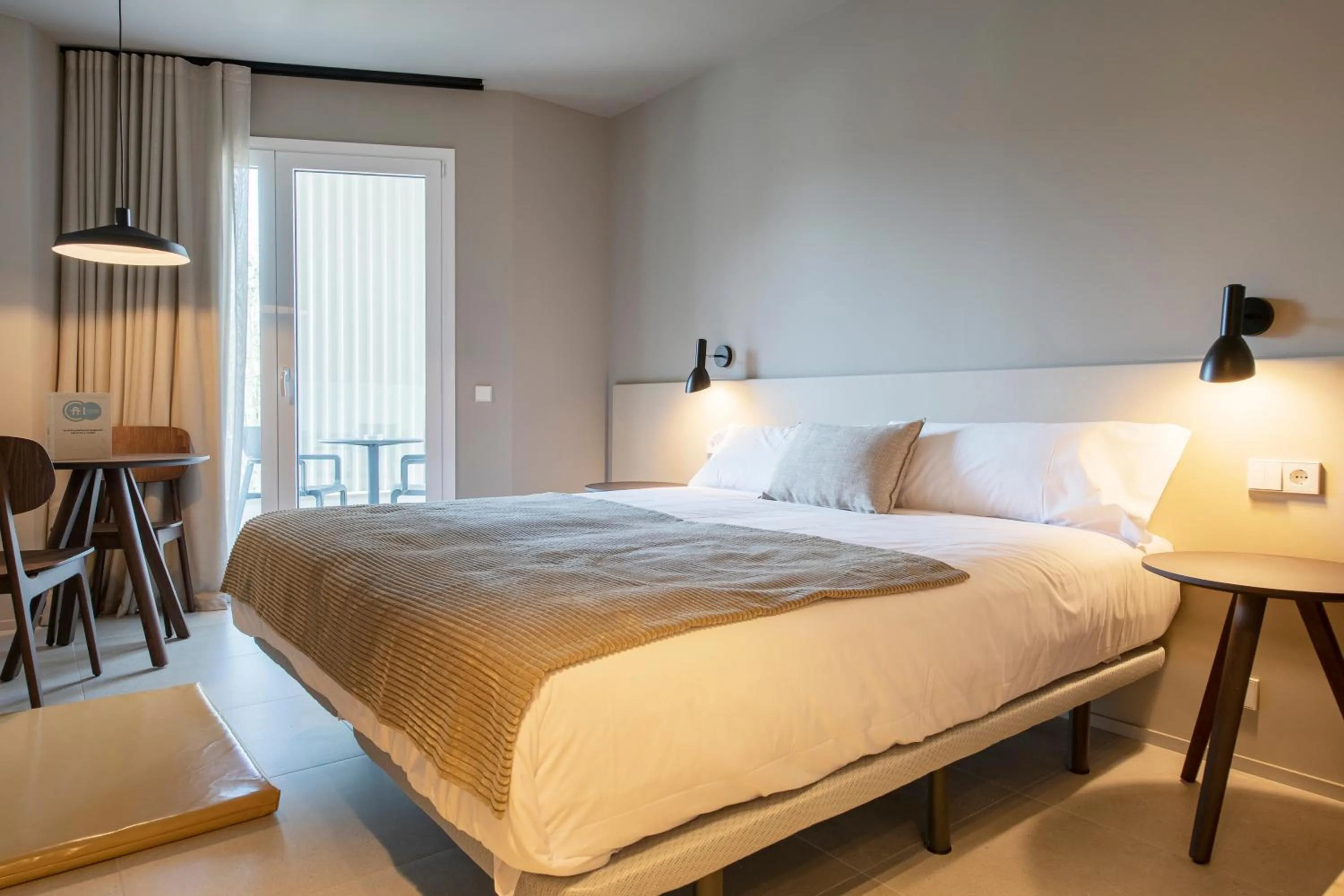 Bed in APARTAMENTS LA CARPA