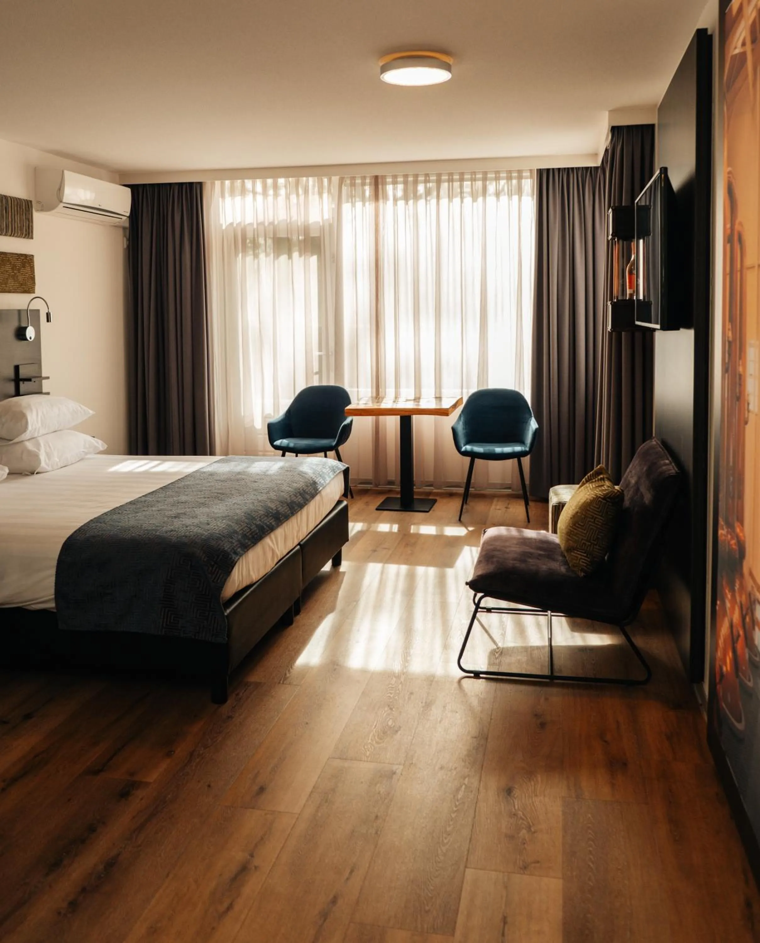 Bed in Hotel de Naaldhof