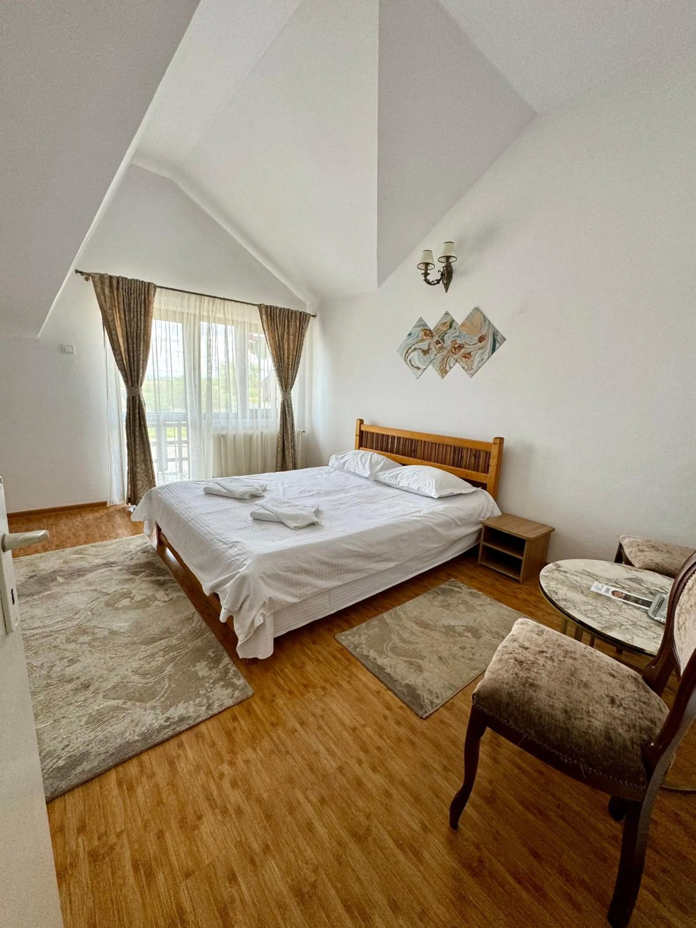 Bed in PENSIUNEA ANA