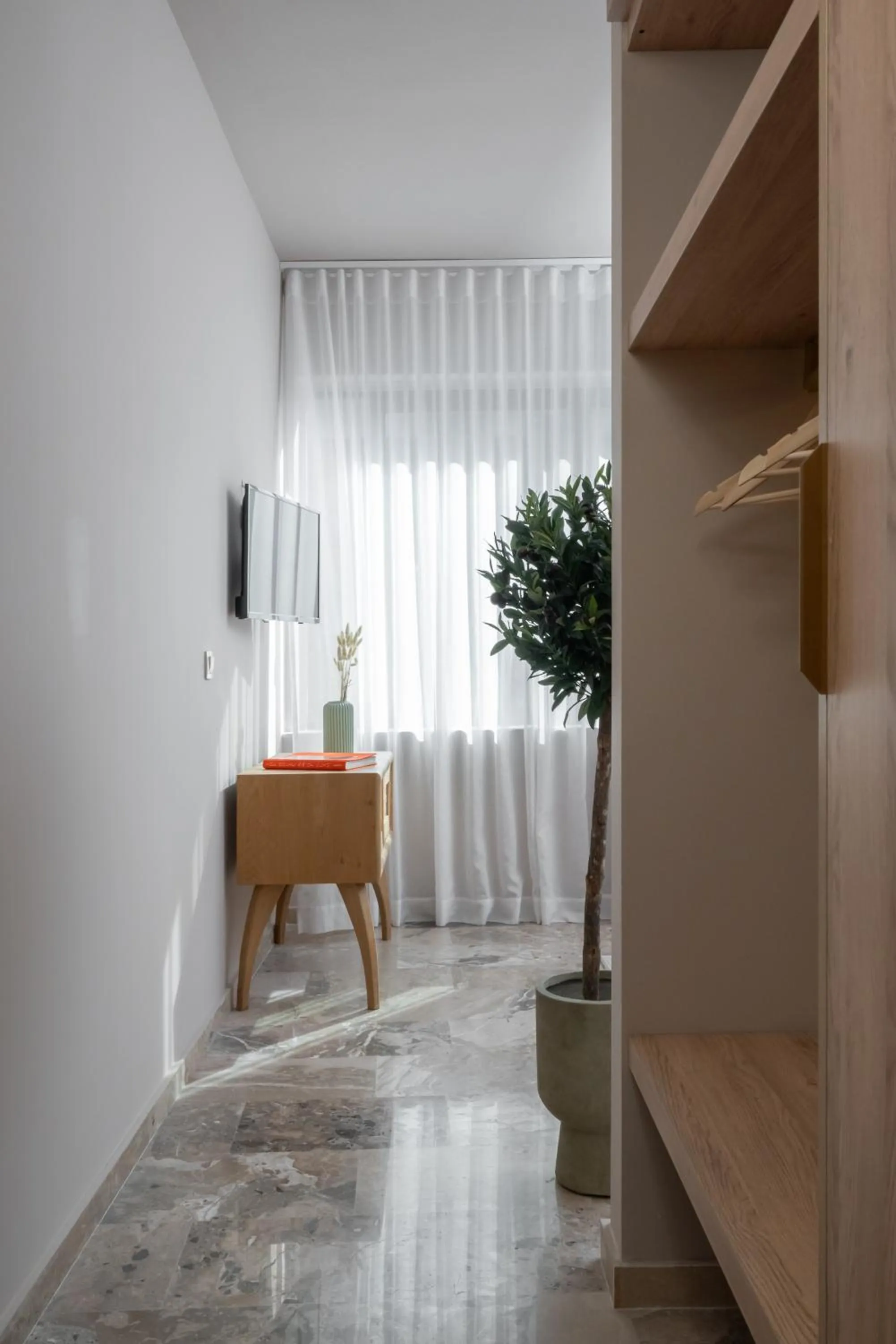 TV and multimedia in Num Suites & Lofts Athens