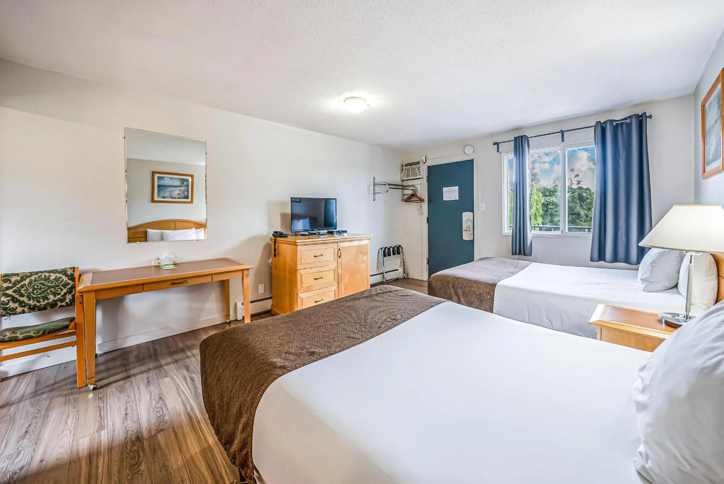 Bed in Bluebird Motel