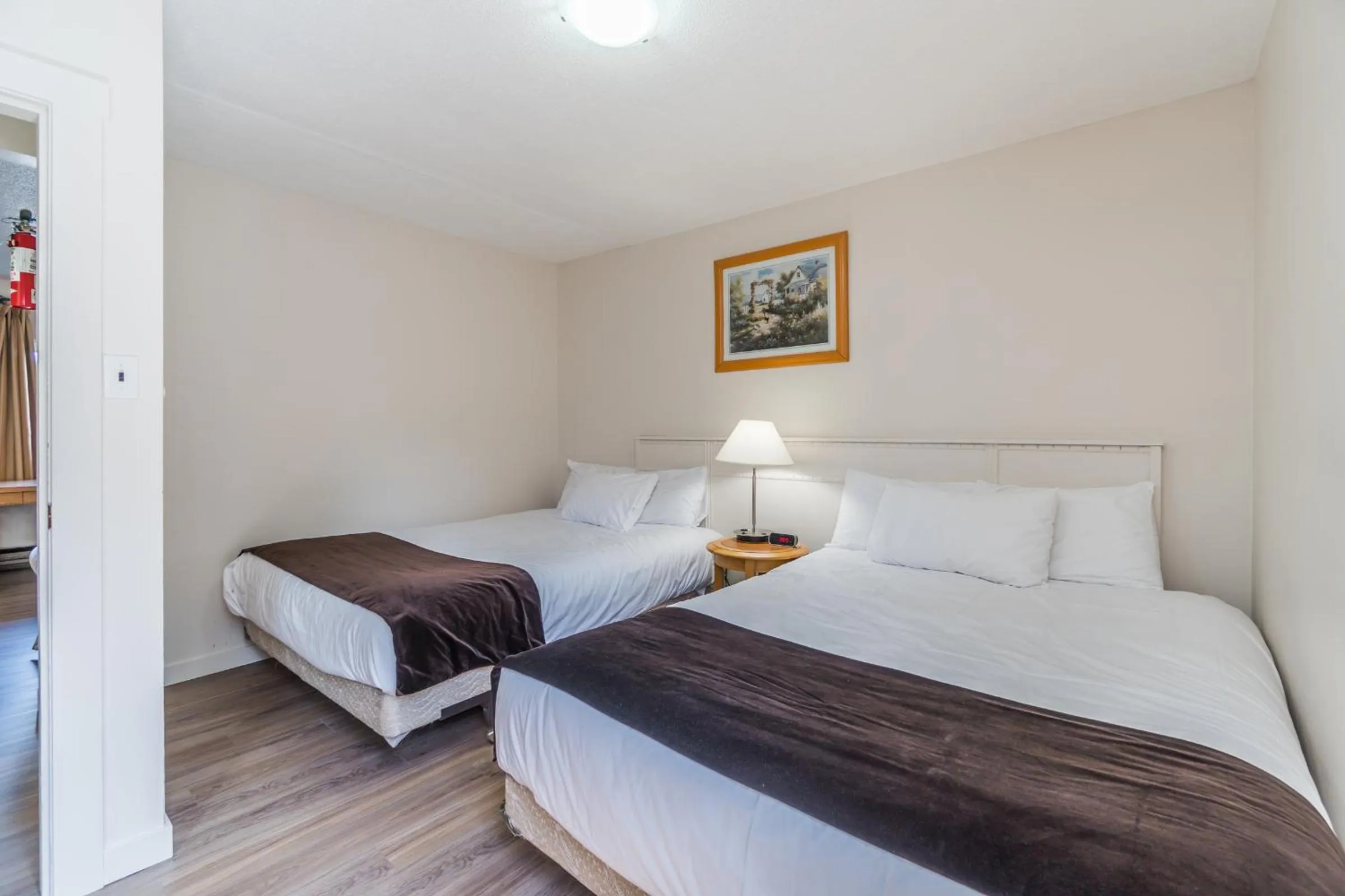 Bed in Bluebird Motel