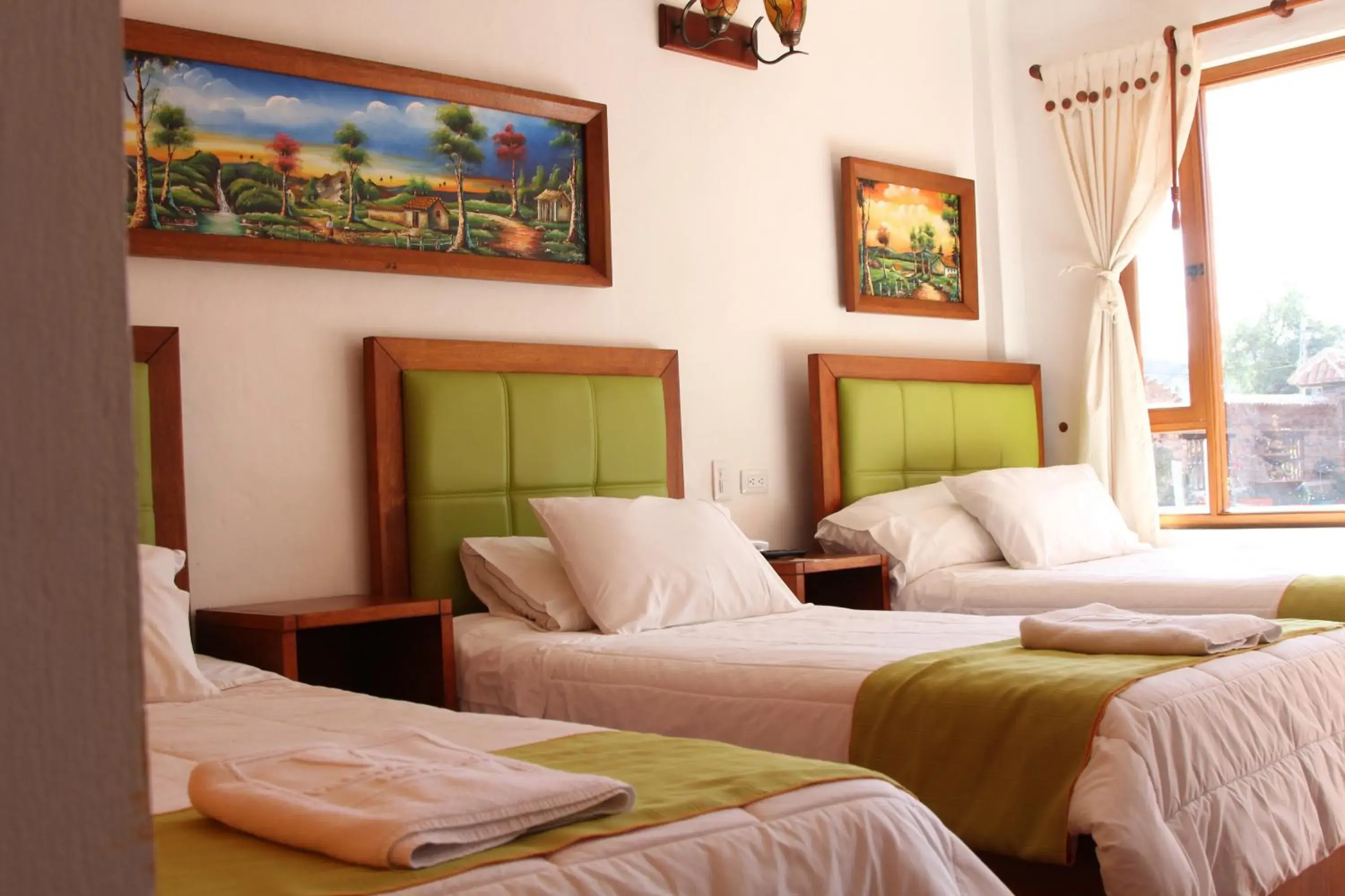 Triple Room in Hotel Villa Alegria Triple Room in Hotel Villa Alegria