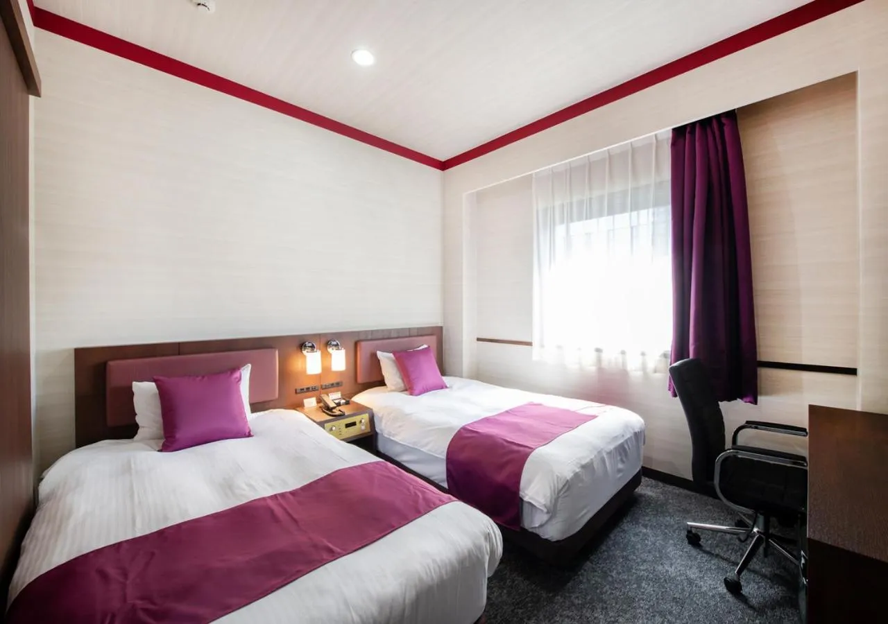 Bed in TKP Sunlife Hotel