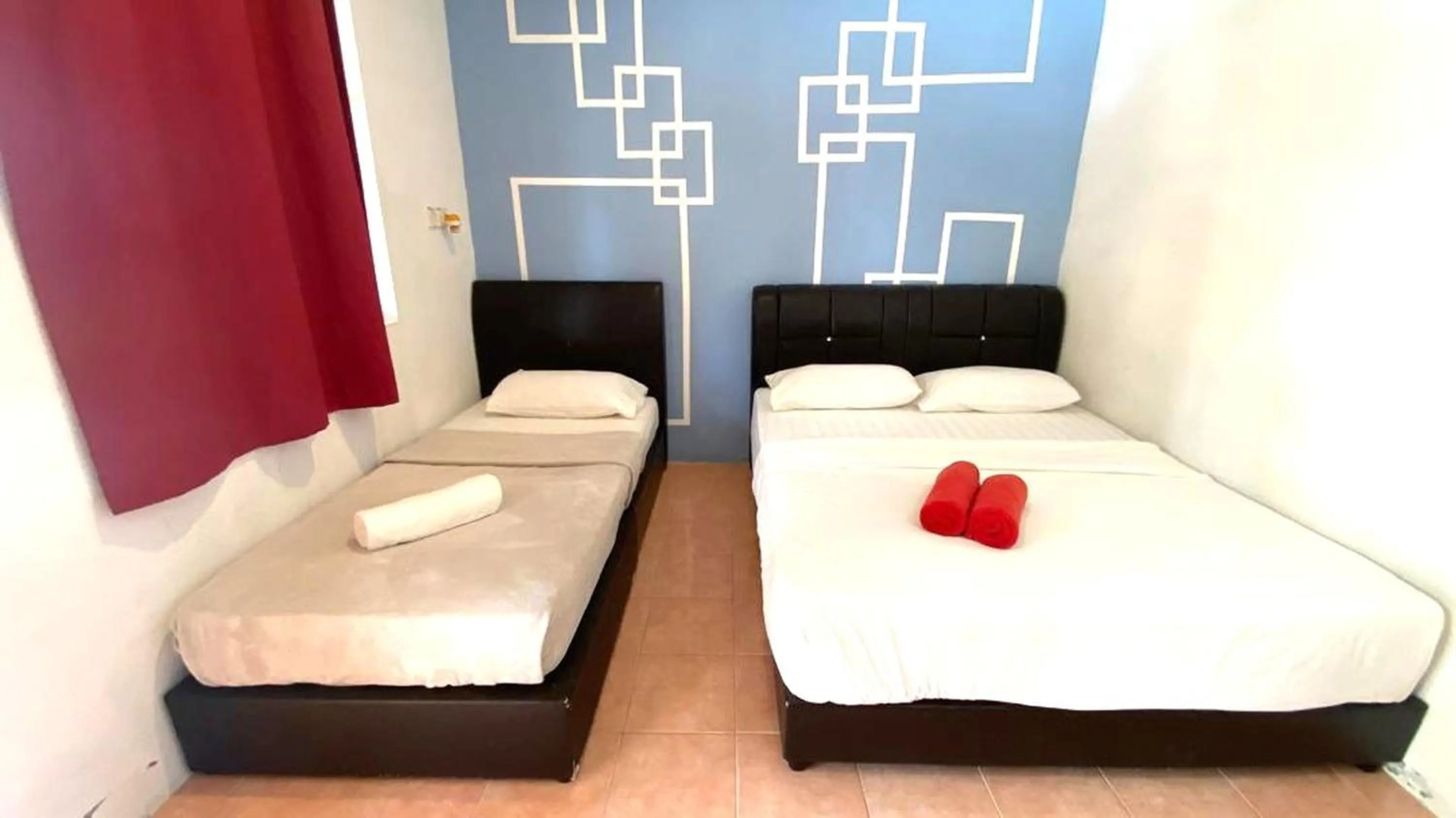 Bedroom, Bed in Capital O 91246 Tokman Inn