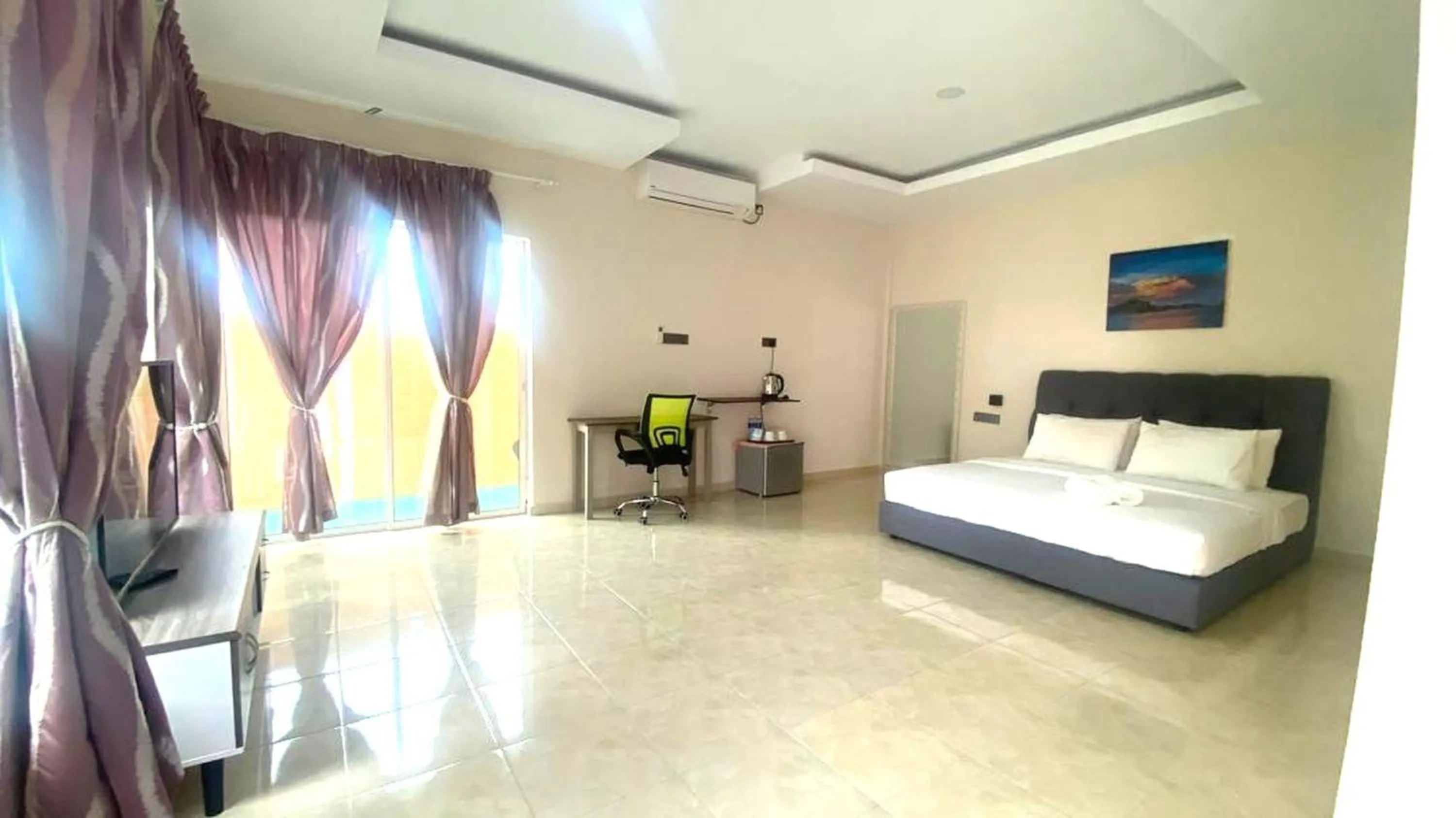 Bedroom, Bed in Capital O 91246 Tokman Inn