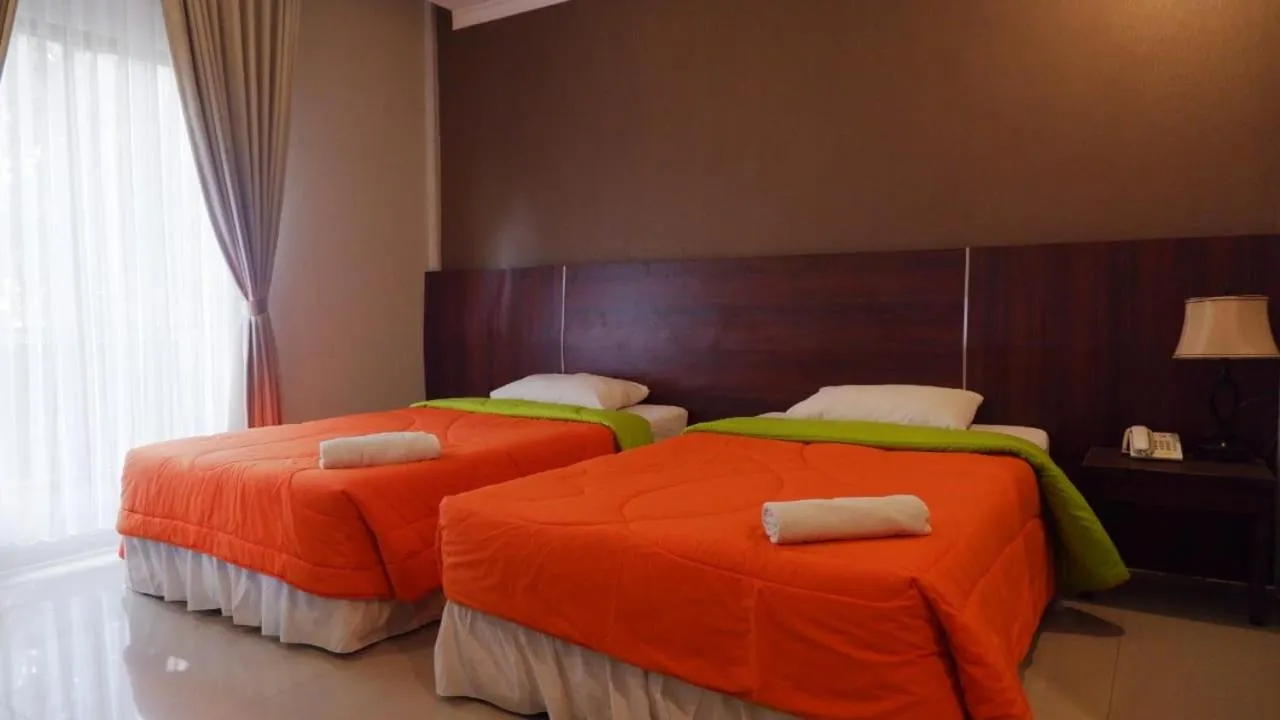 Bed in Bumi Gumati Resort & Convention