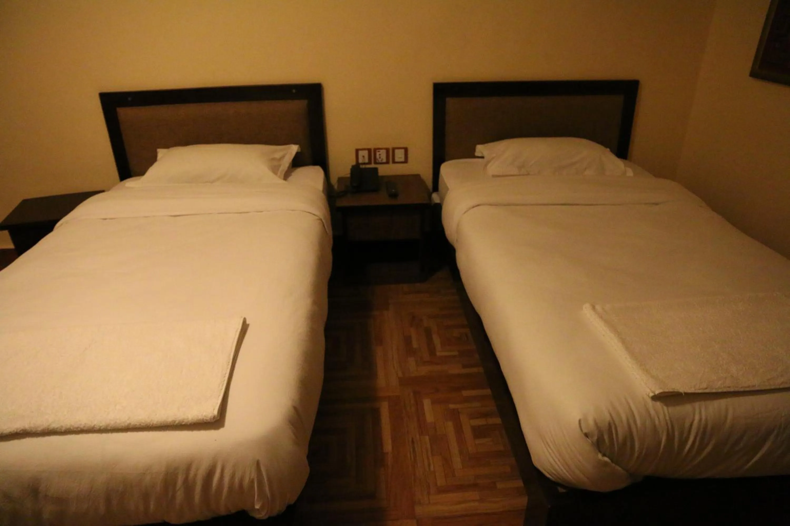 Bed in Boudha Stupa View Guest House