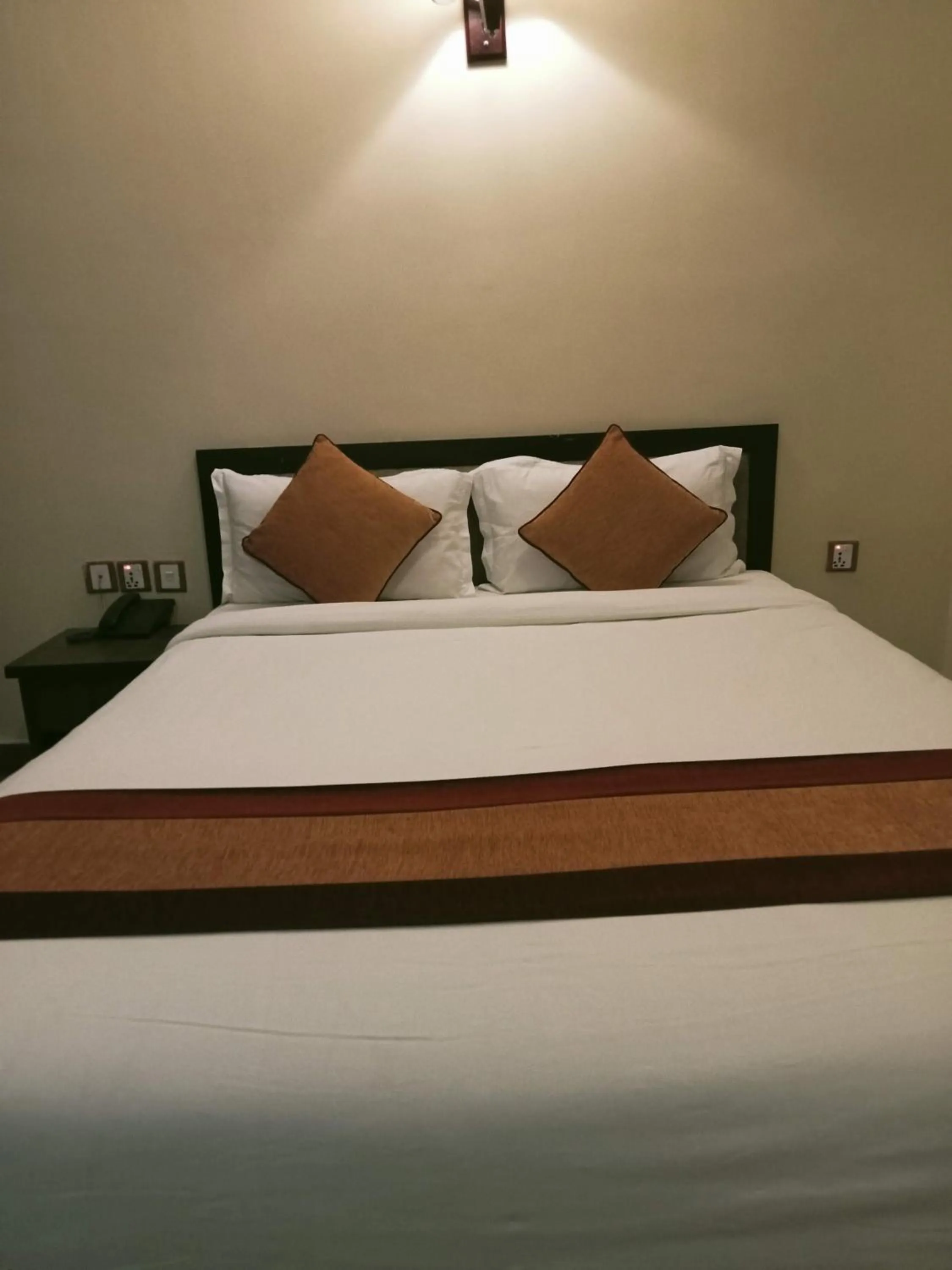 Bed in Boudha Stupa View Guest House