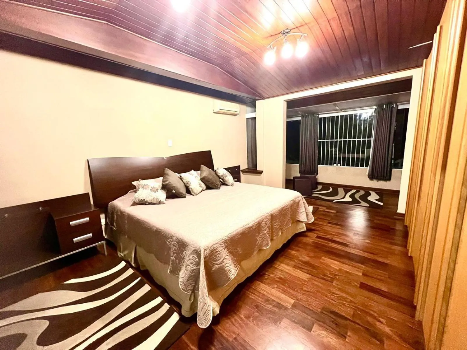 Communal lounge/ TV room, Bed in Recanto Ninho Verde Village