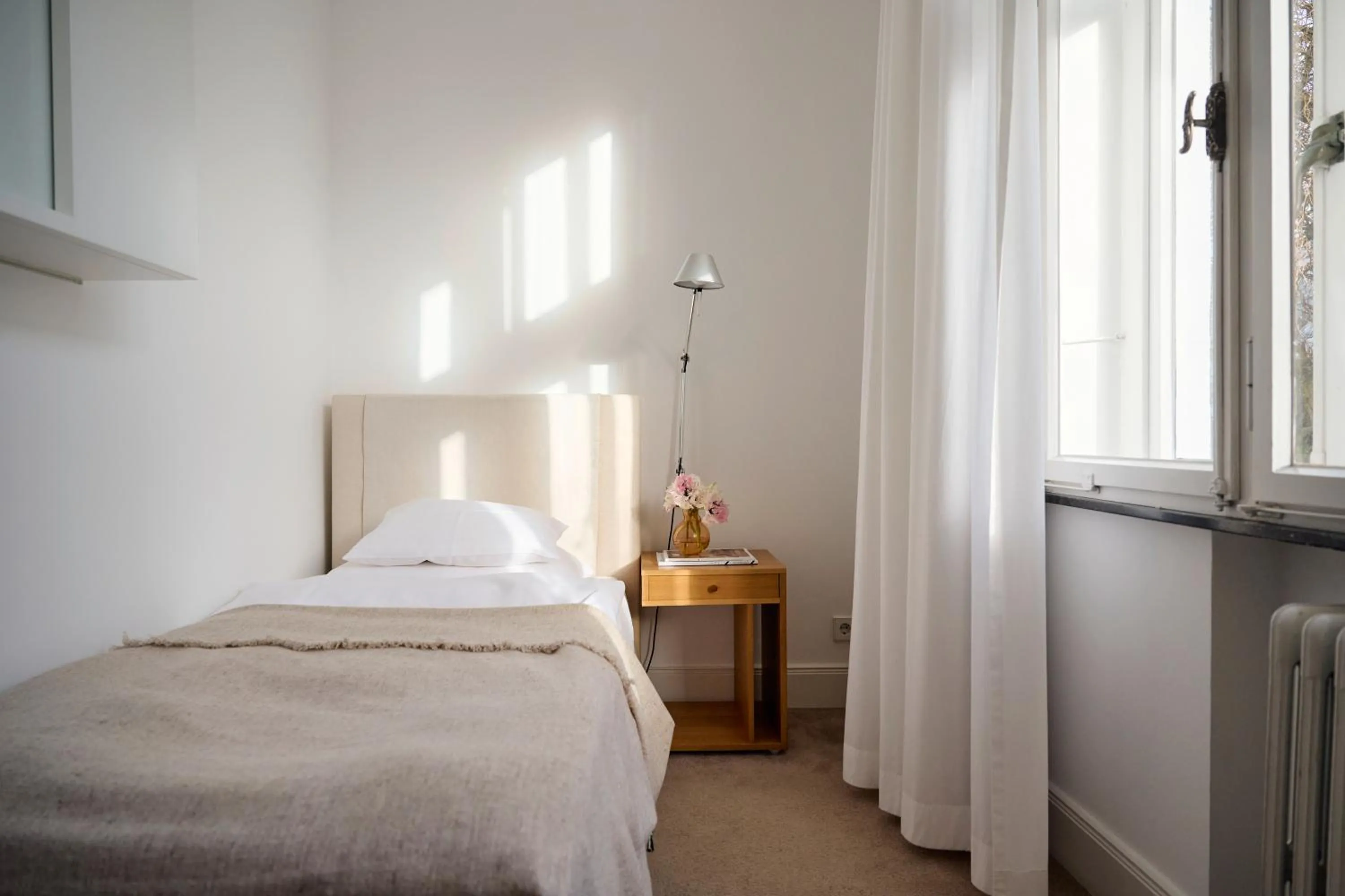 Photo of the whole room, Bed in Hotel Haus Norderney