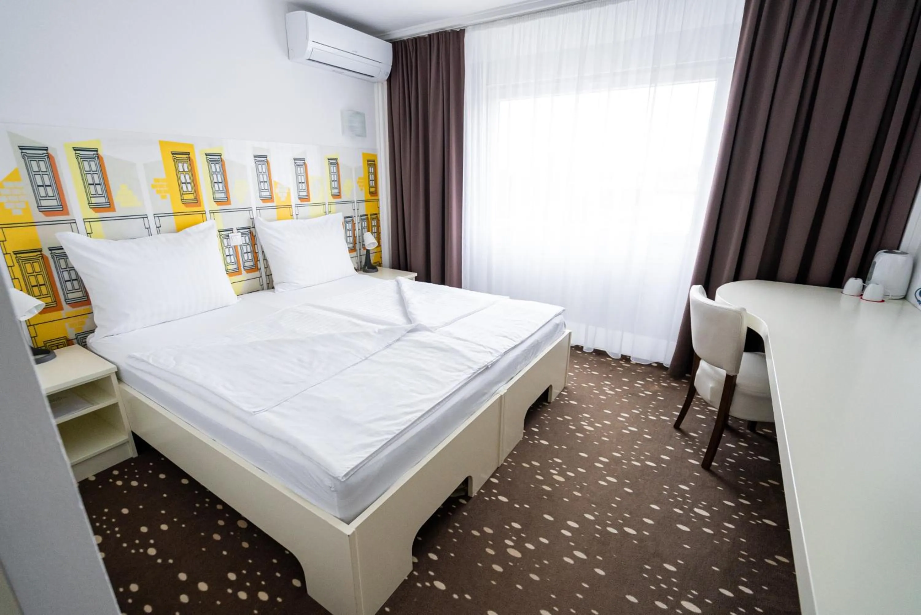 Bed in City Hotel Krško