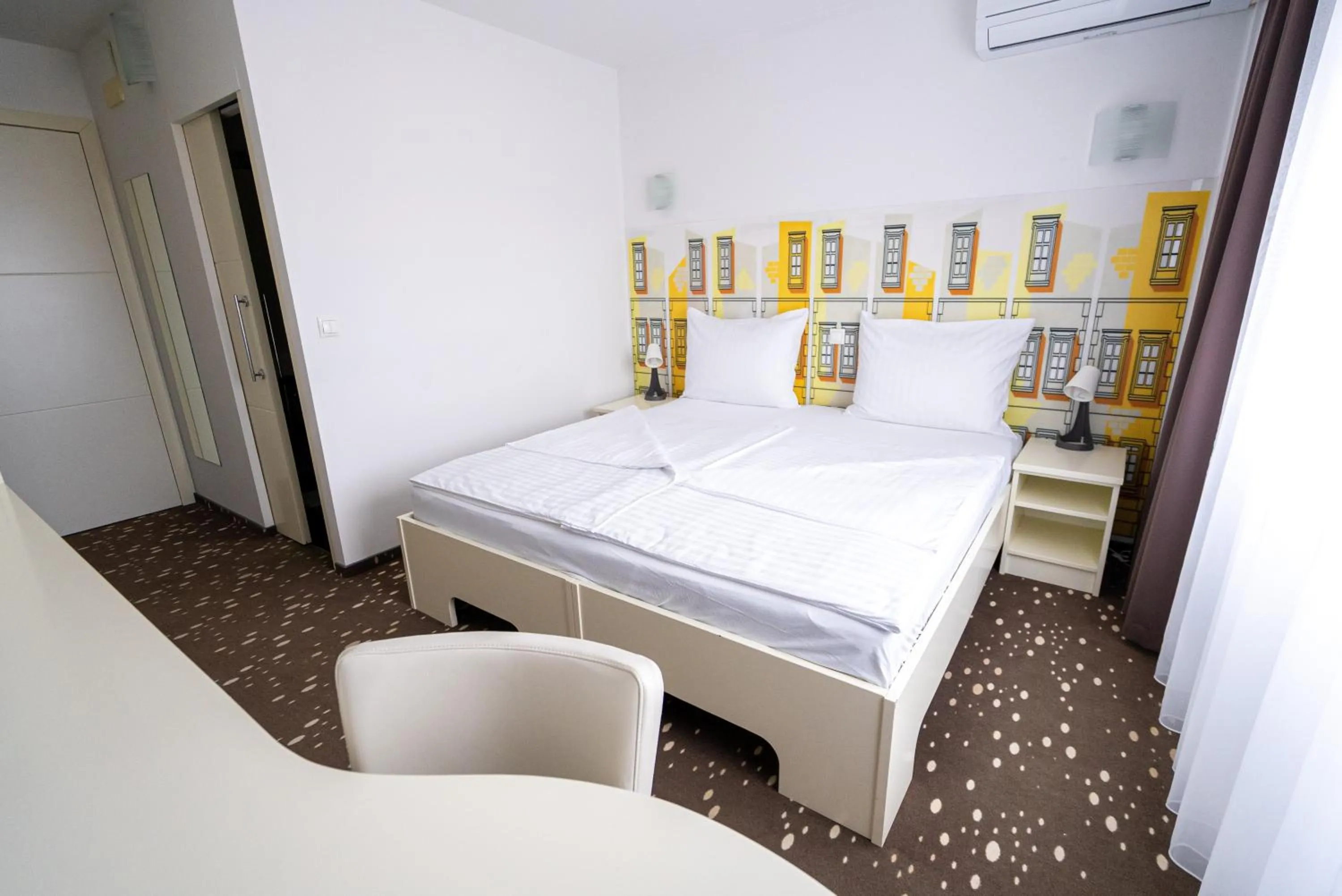 Bed in City Hotel Krško