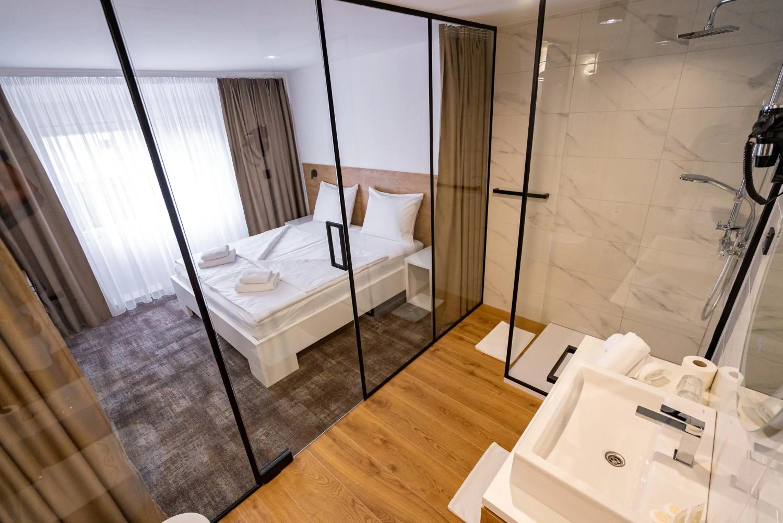 Bed in City Hotel Krško