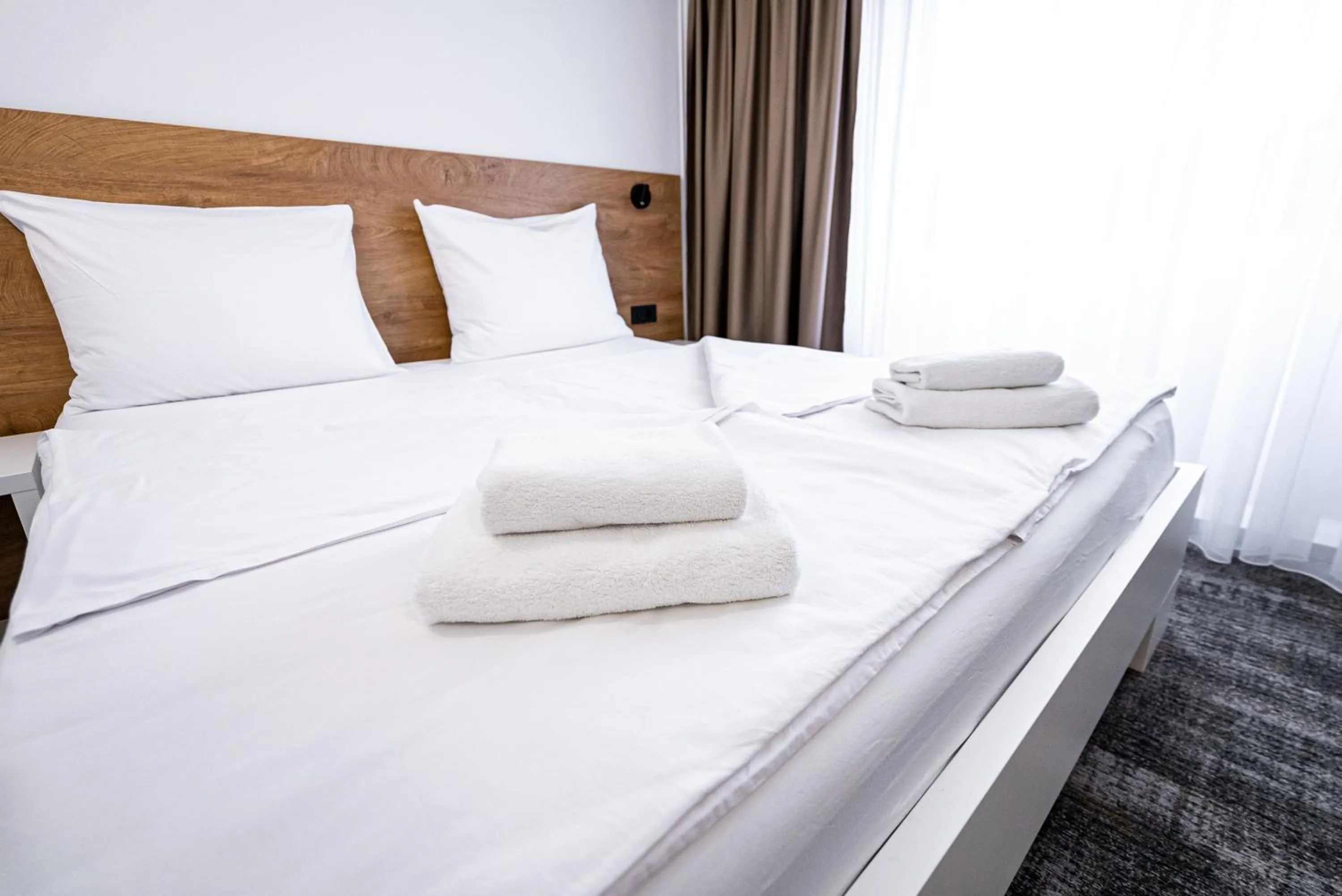 Bed in City Hotel Krško