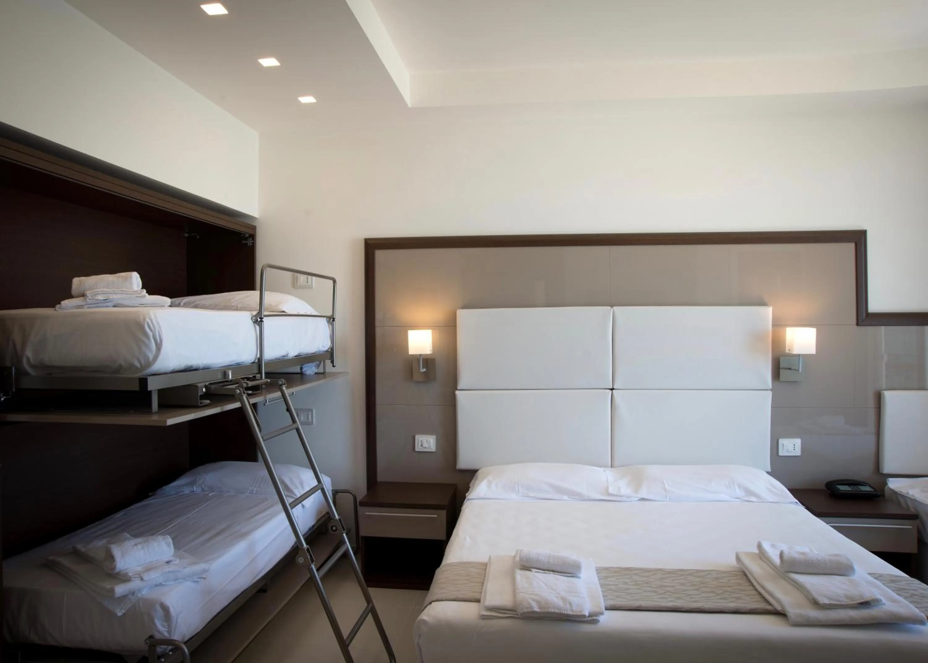 Bed in Hotel Baia Marina