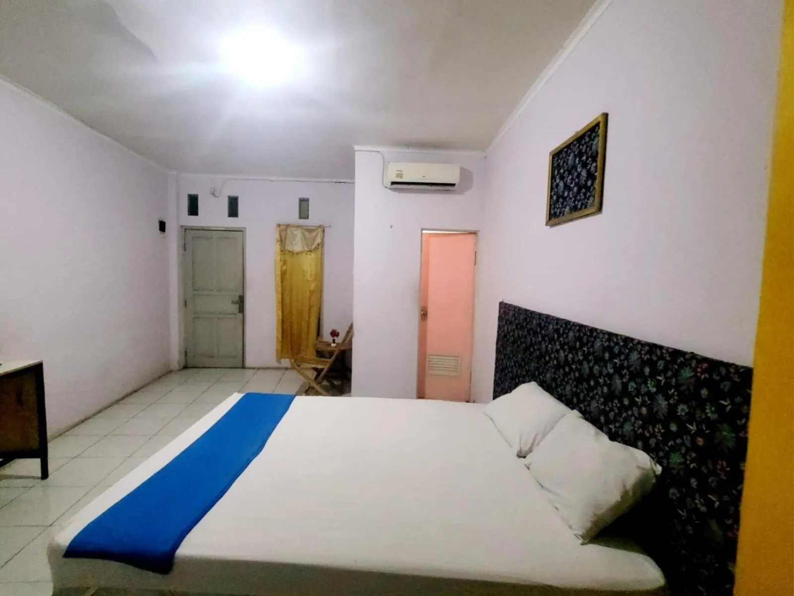 Bed in Wisma Gahalta by Fans