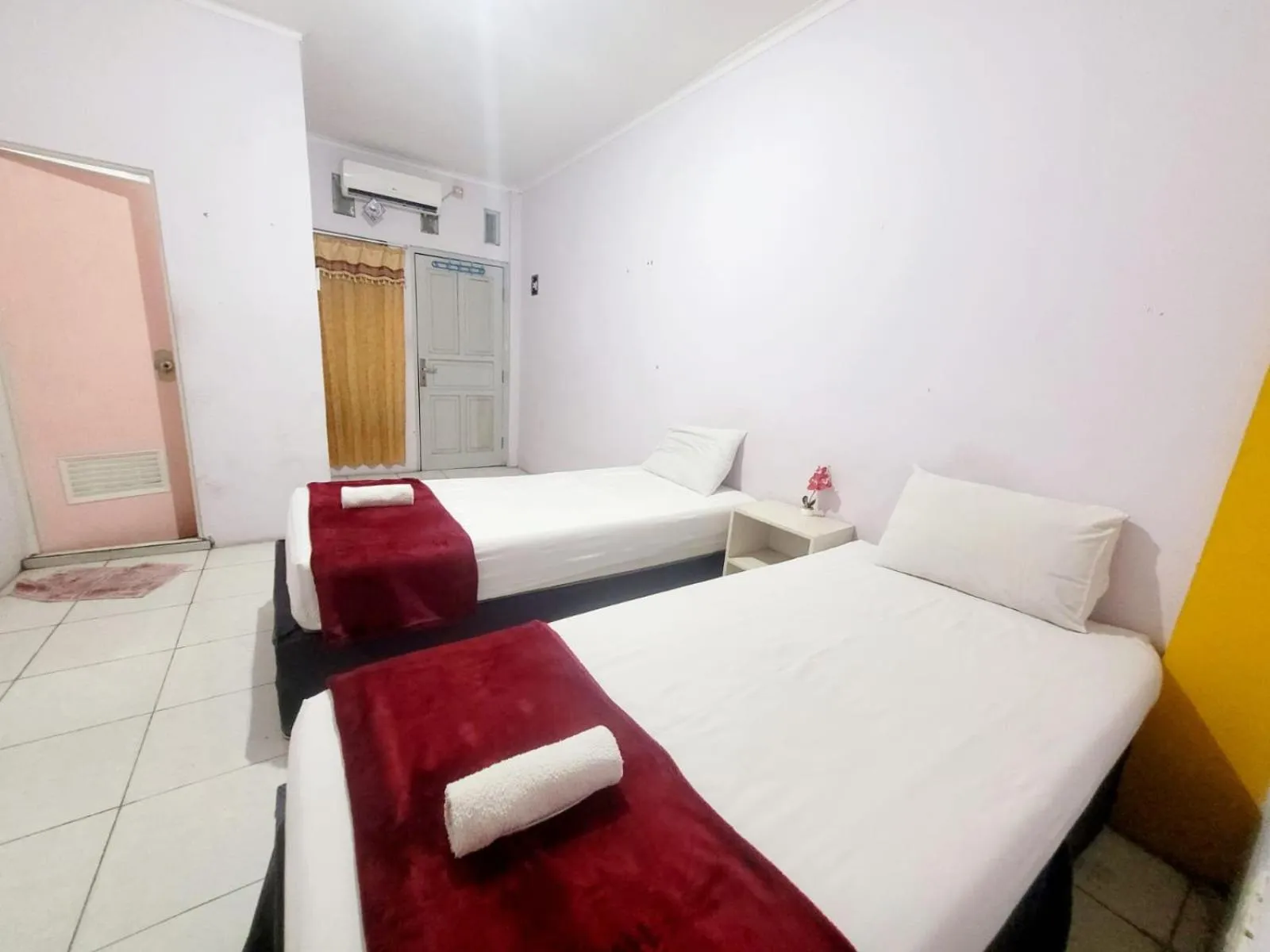 Bed in Wisma Gahalta by Fans