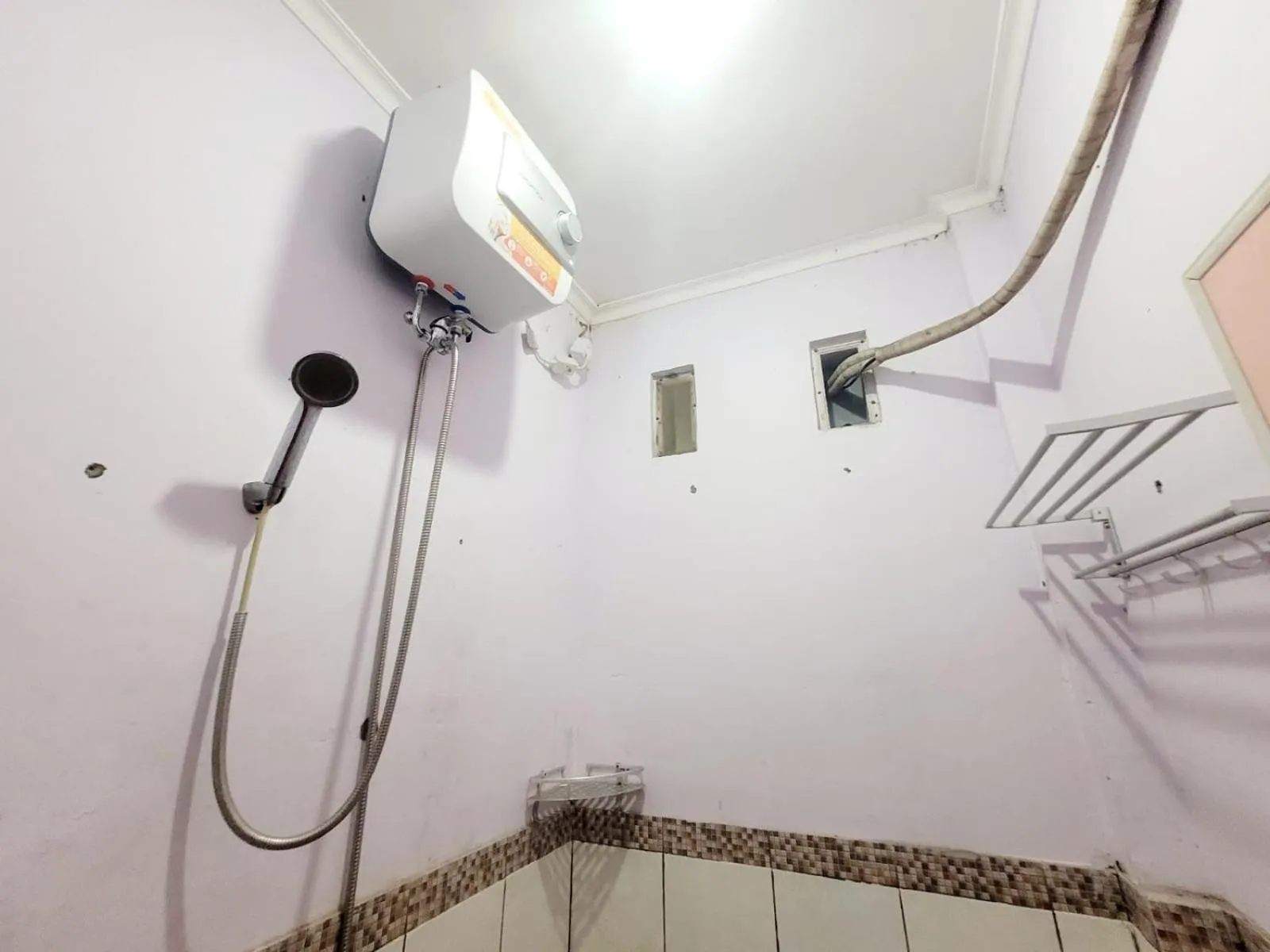 Bathroom in Wisma Gahalta by Fans