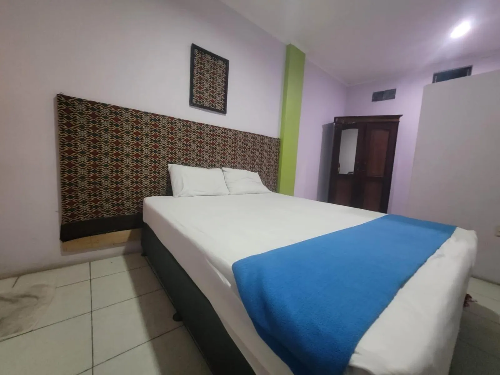 Bed in Wisma Gahalta by Fans