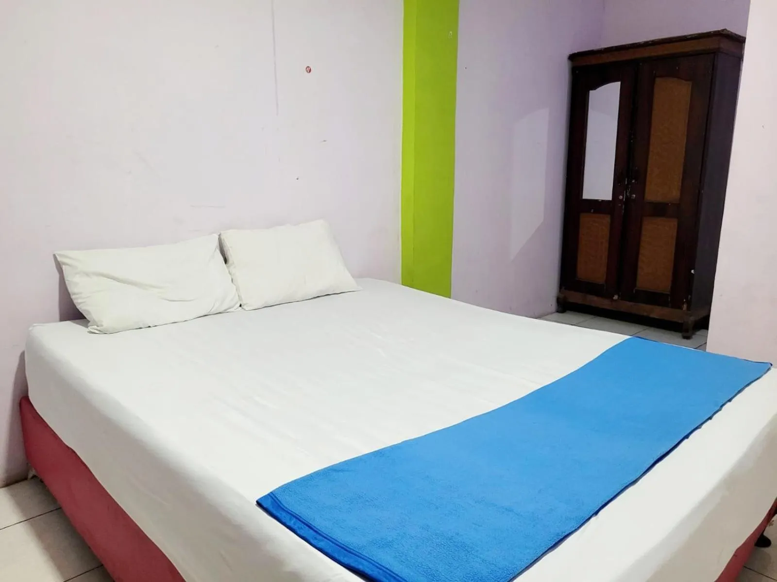 Bedroom in Wisma Gahalta by Fans